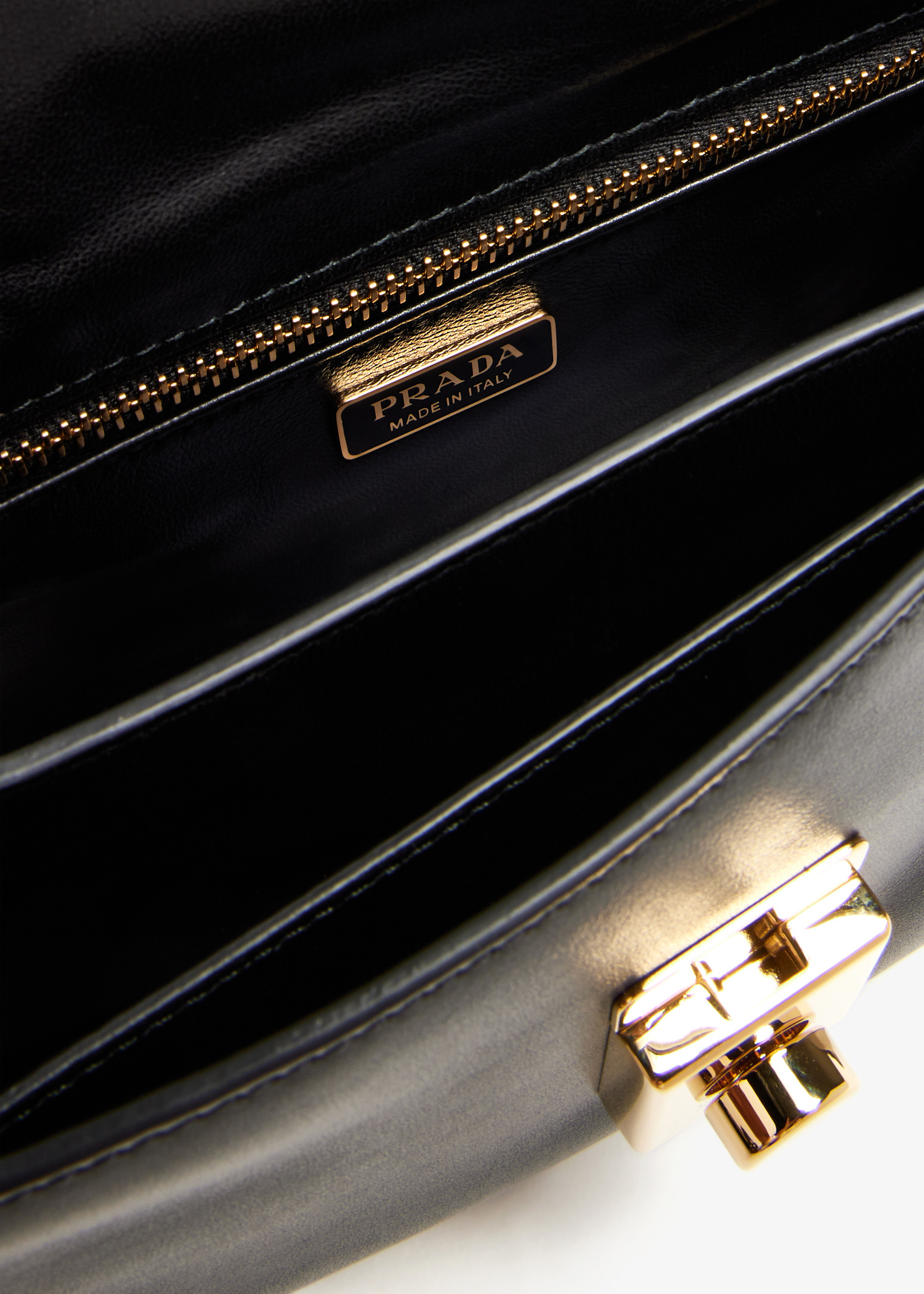 PRADA Vernice Metal Triangle Logo Mini Drawcord Pouch