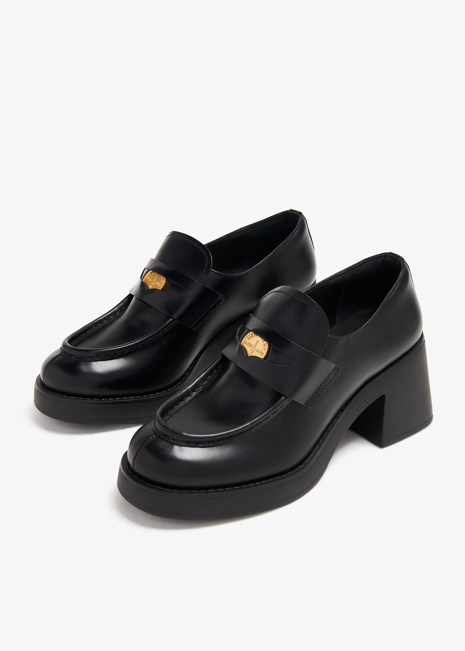 Miu Miu Leather penny loafers for Women - Black in Qatar