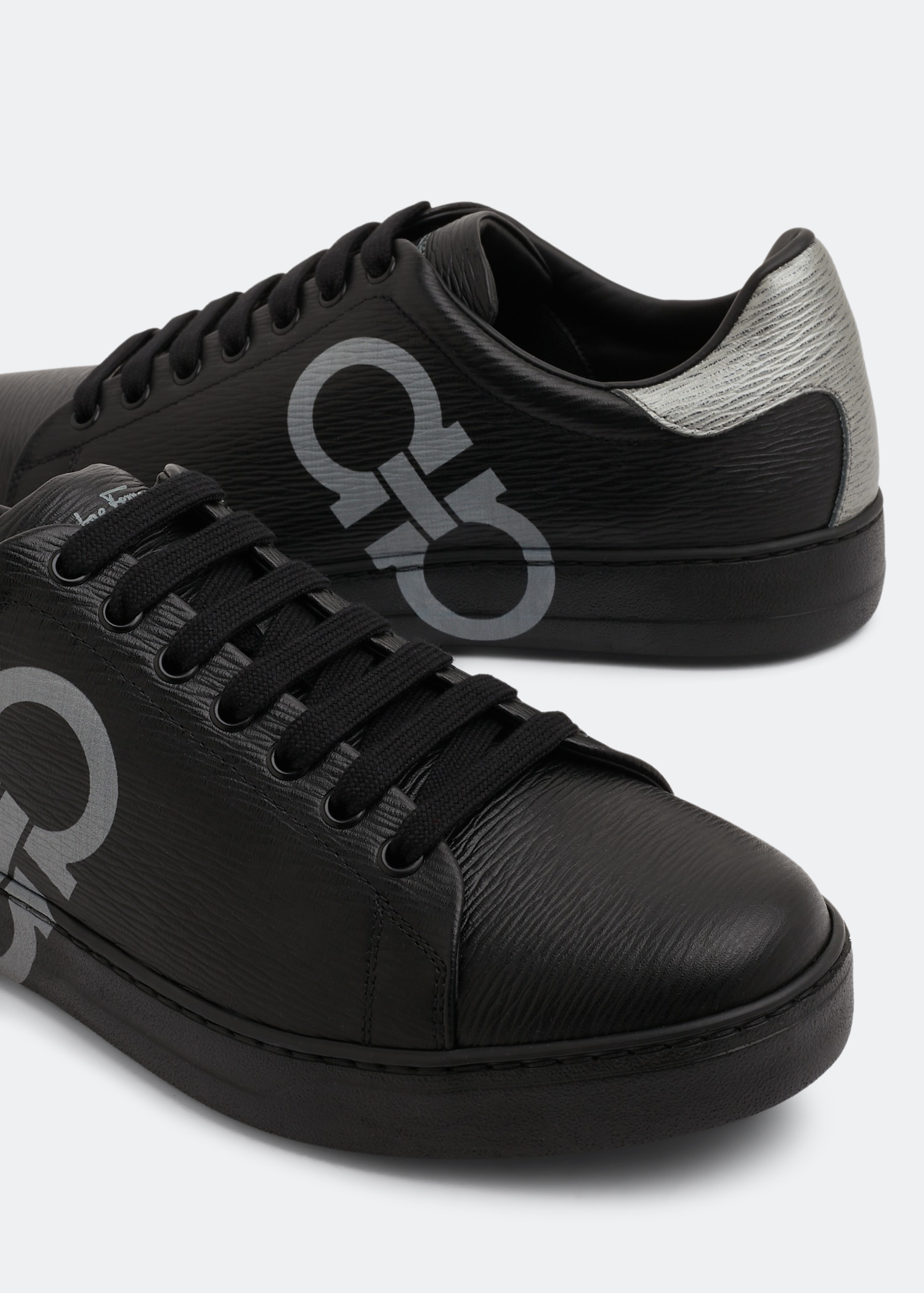Ferragamo Gancini sneakers for Men - Black in UAE | Level Shoes