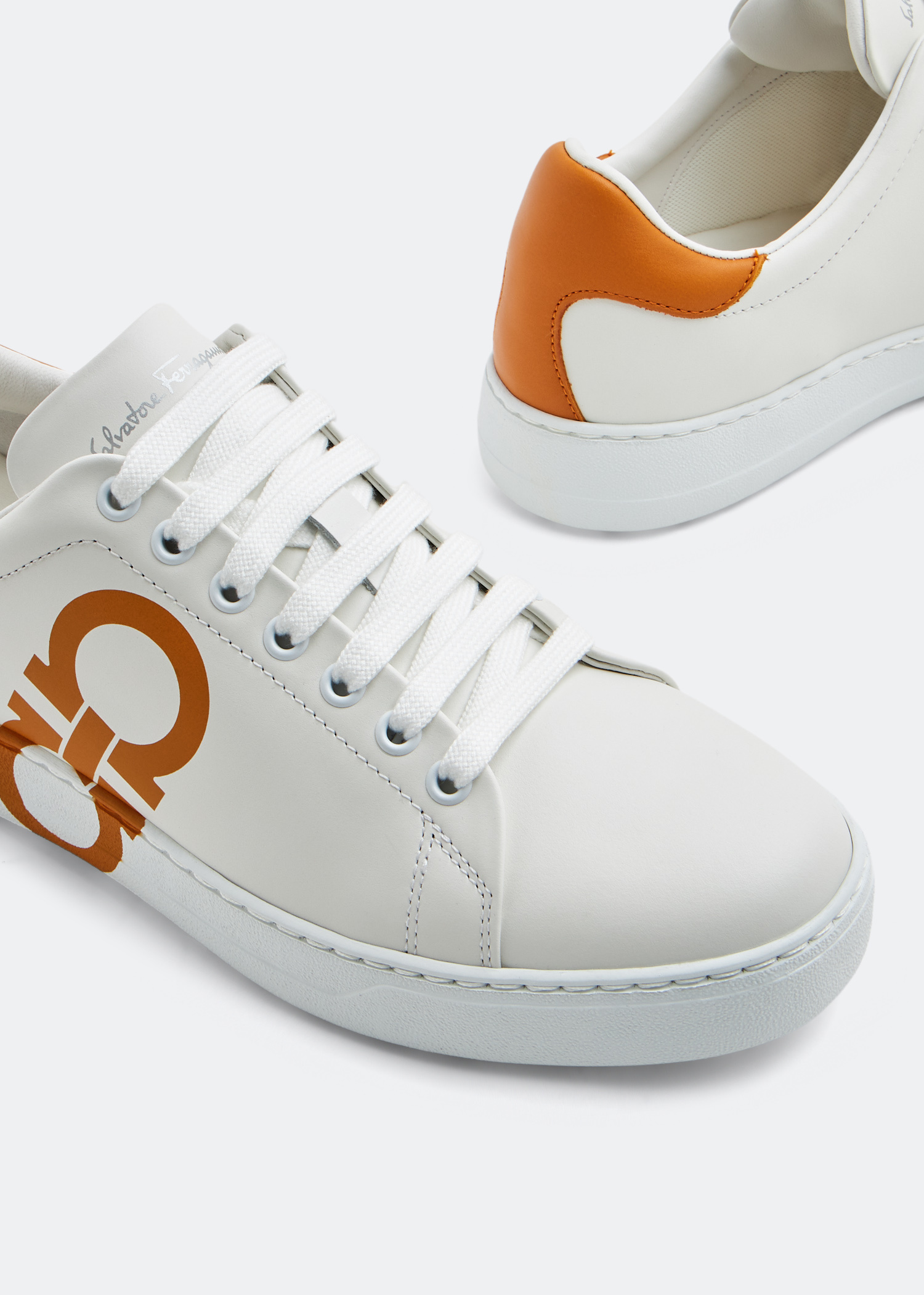 Ferragamo Gancini sneakers for Men - White in UAE | Level Shoes