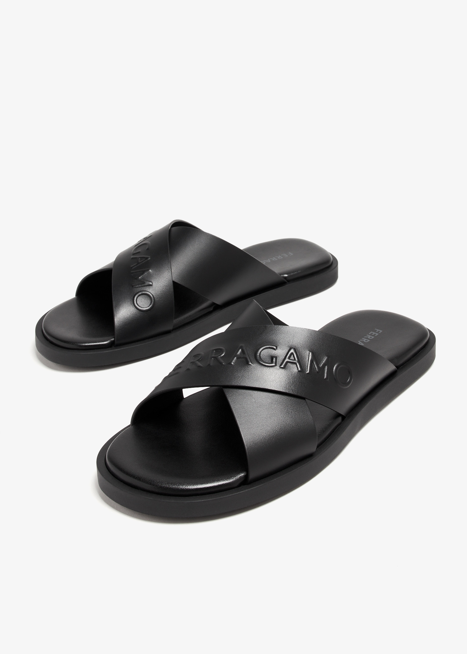 【送料&関税込】Ferragamo Leather Sandals Ferragamo Crossover sandals for Men - Black in UAE | Level Shoes