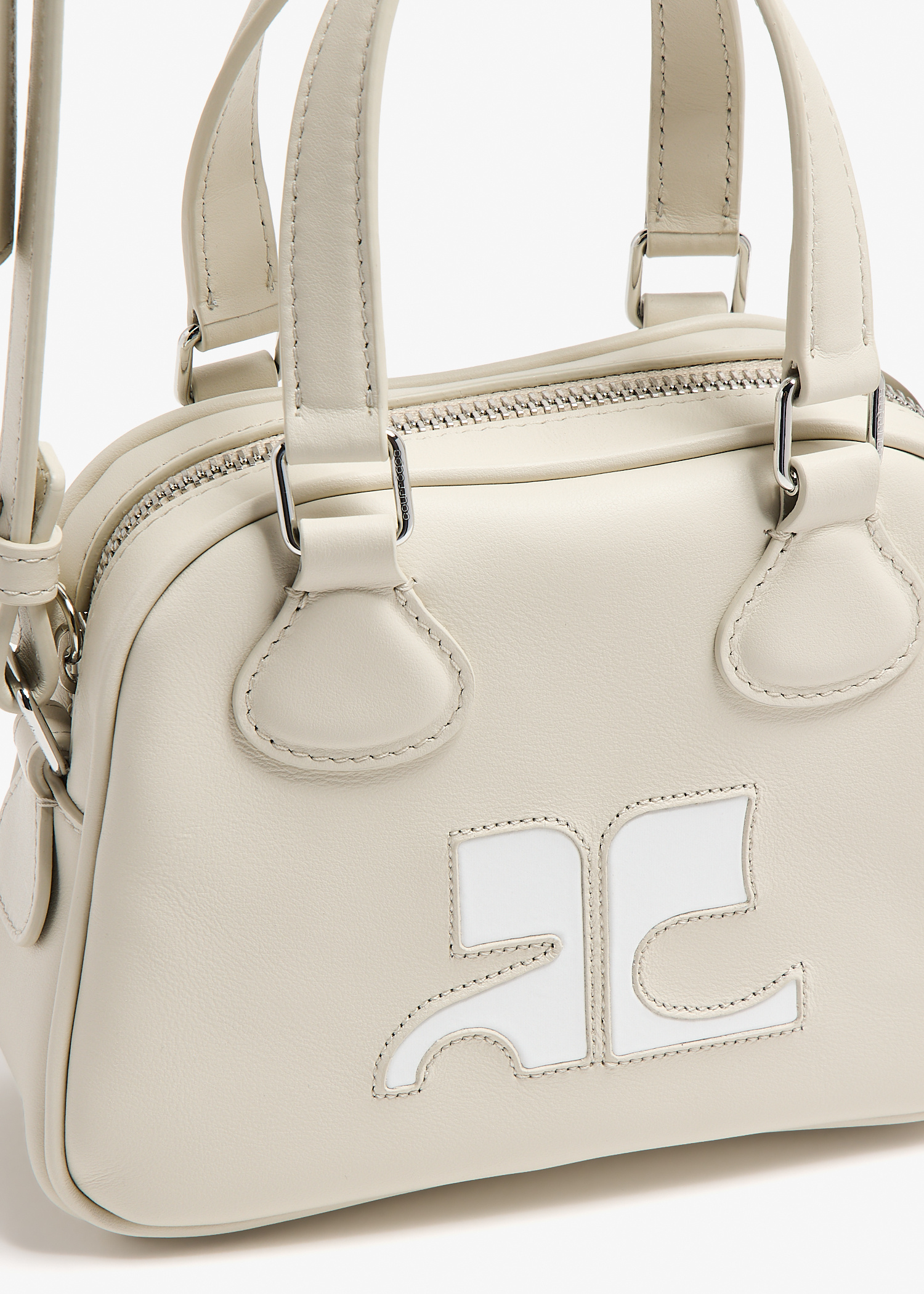 Courrèges Mini leather bowling bag for Women - Beige in UAE