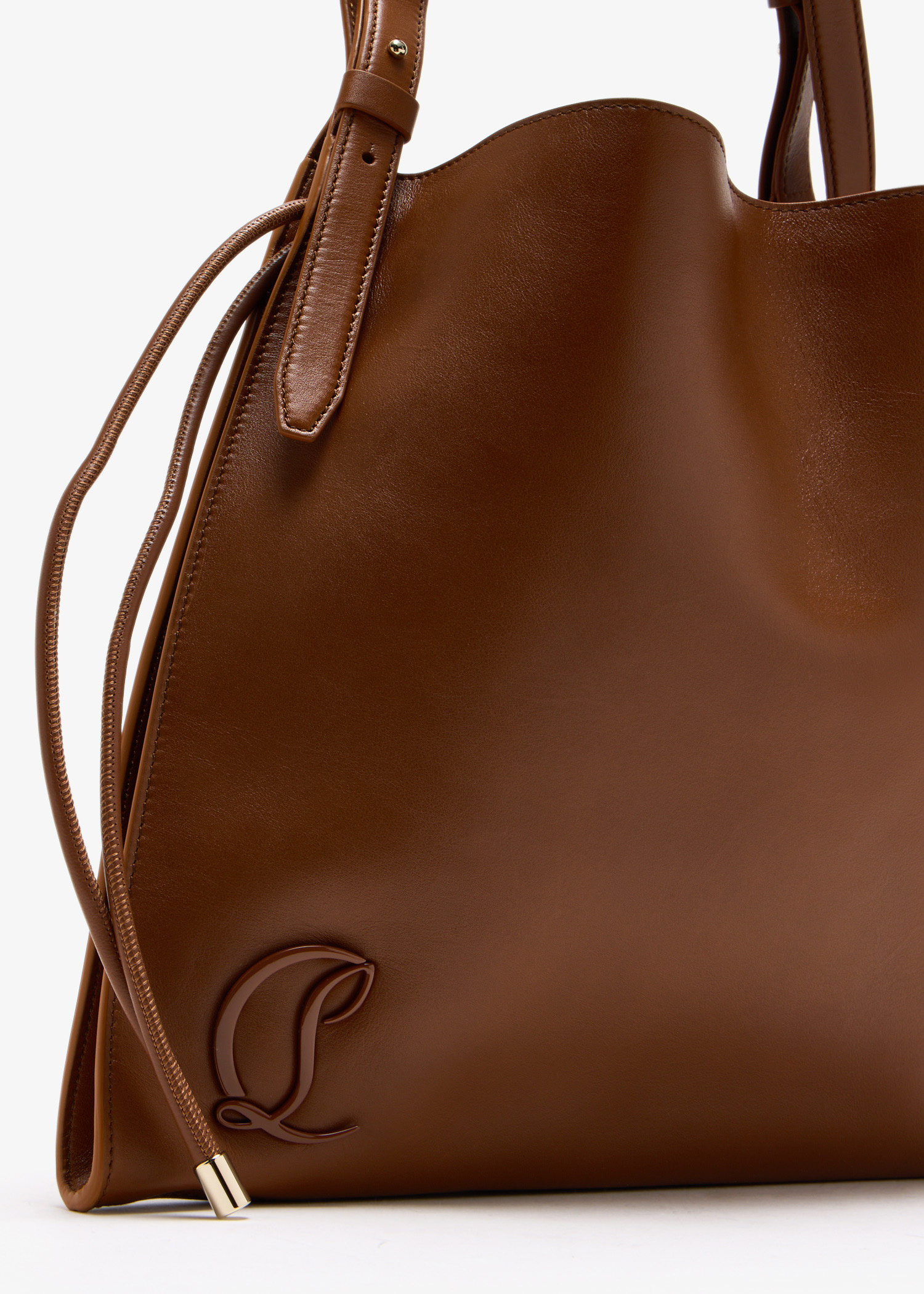 トートバッグ Christian Louboutin Brown Suede Baggy Tote Bag Baggy suede tote bag in brown - Christian Louboutin | Mytheresa