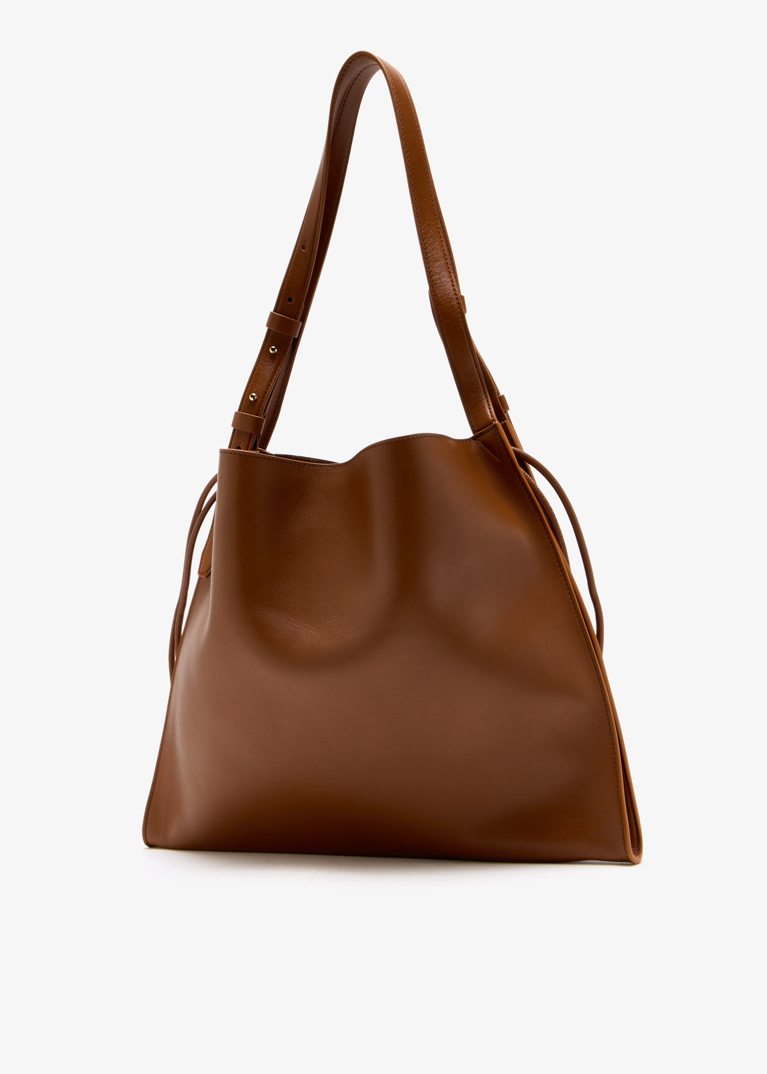 【関税&送料込】Christian Louboutin Brown Suede Baggy Tote B Baggy suede tote bag in brown - Christian Louboutin | Mytheresa