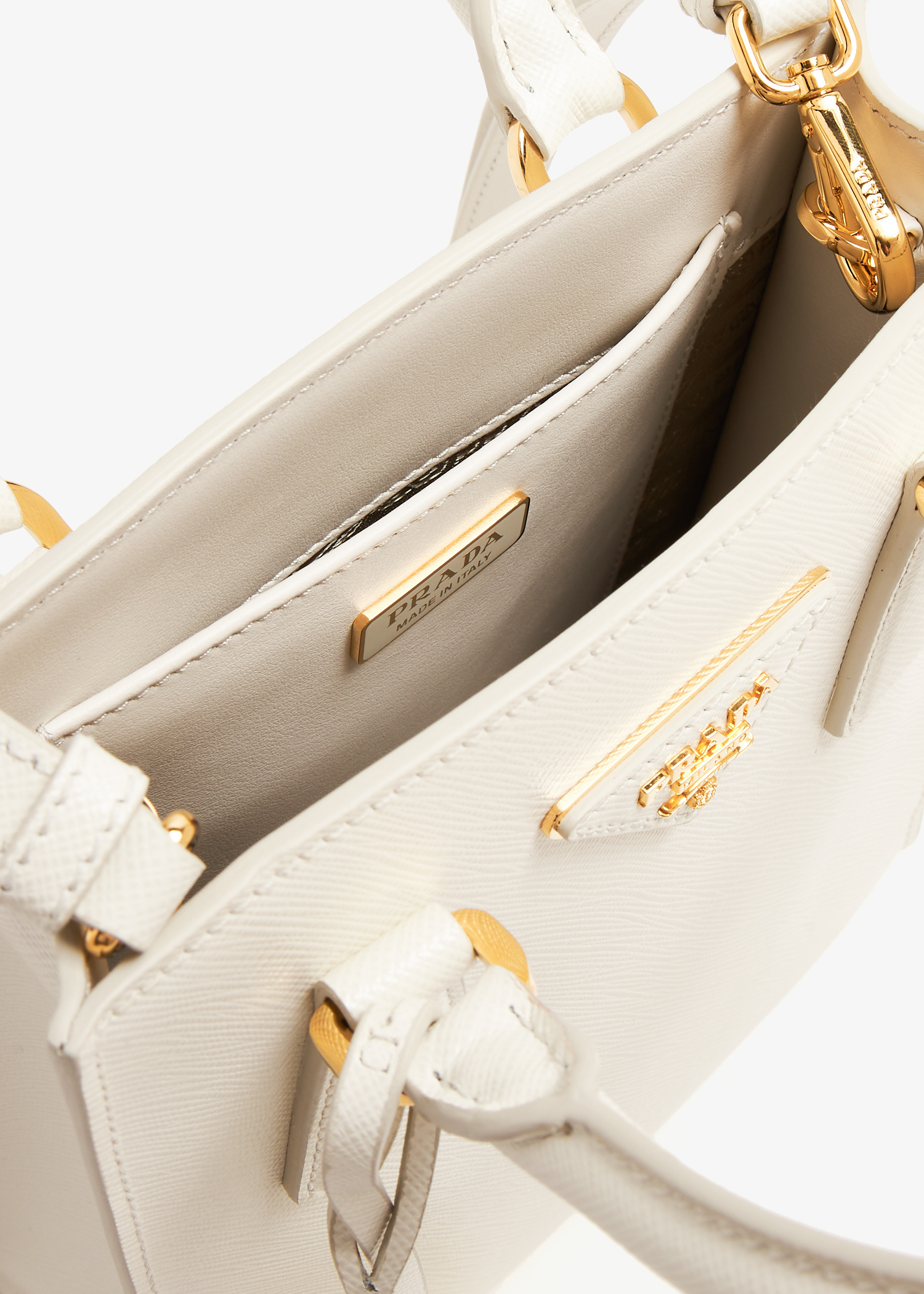 Prada Saffiano leather handbag for Women - White in UAE | Level Shoes