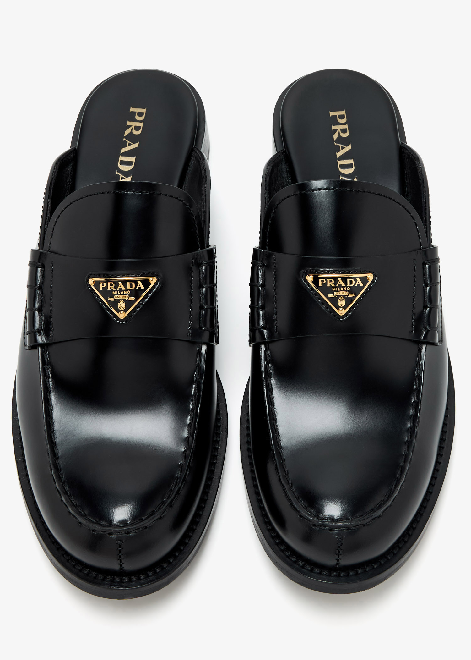Prada Brushed leather mules for Women - Black in UAE | Level Shoes