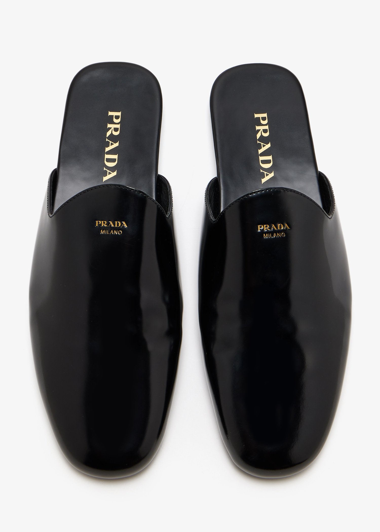 Prada Brushed leather mules for Women - Black in UAE | Level Shoes