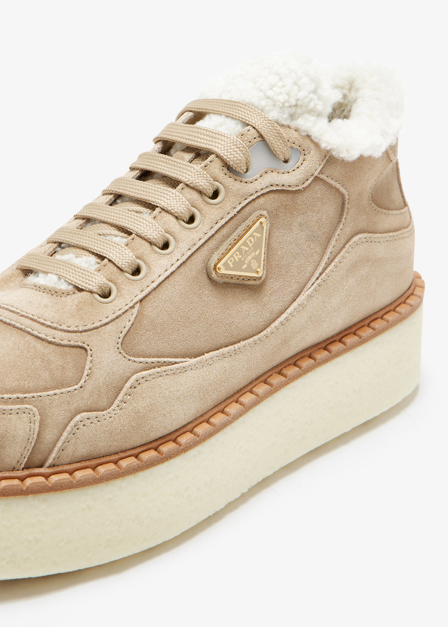 Prada Suede mid-top sneakers for Women - Beige in UAE | Level Shoes