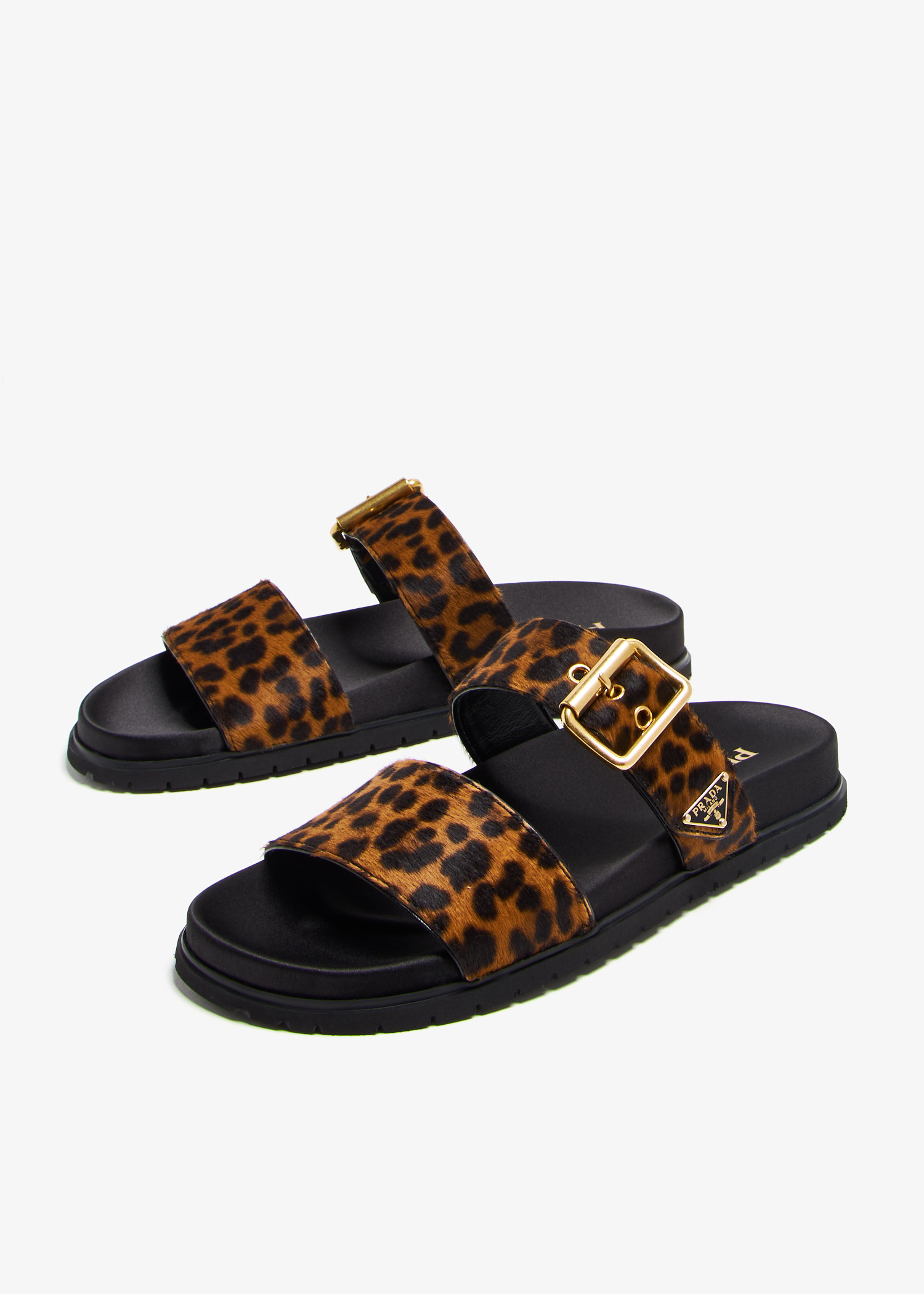 スリッポン PRADA PRINTED CALF HAIR SLIPPERS Prada Printed slide sandals for Women - Animal Printed in