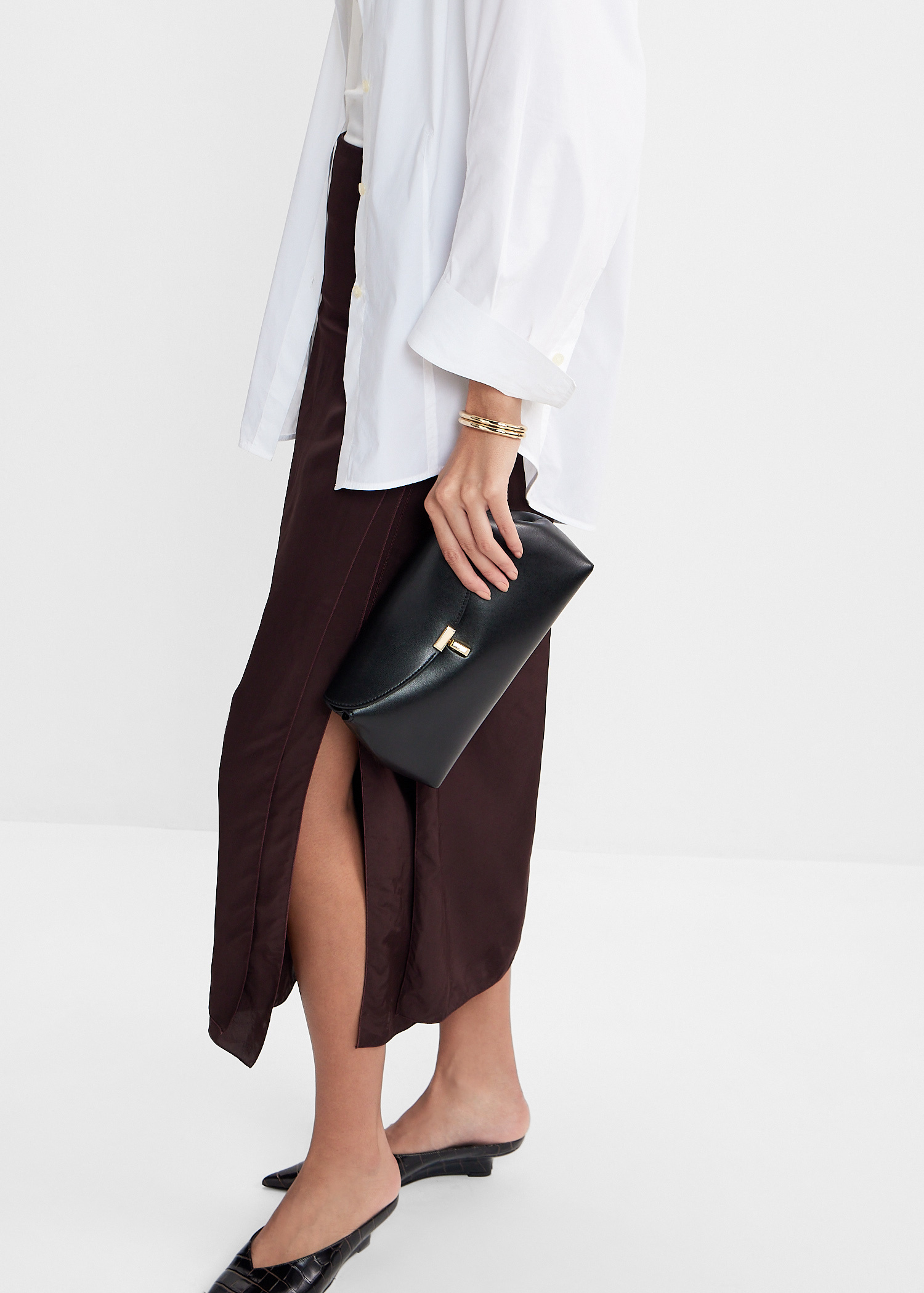 TOTEME T-Lock ポニーヘア クラッチ【関税なし】 T-Lock Clutch — Tan – La Garçonne