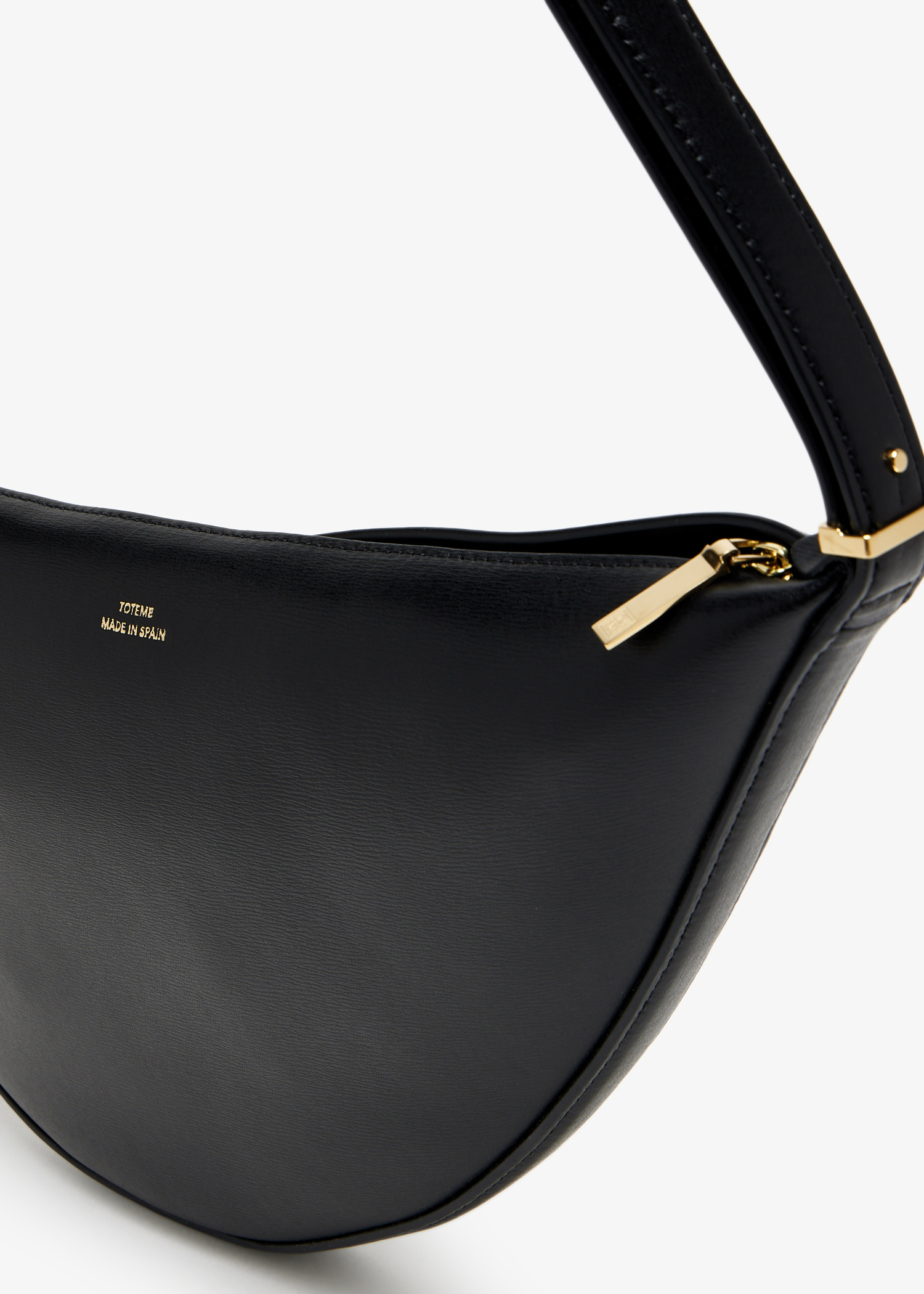 TOTEME Scooped sling bag for Women - Black in UAE | Level Shoes