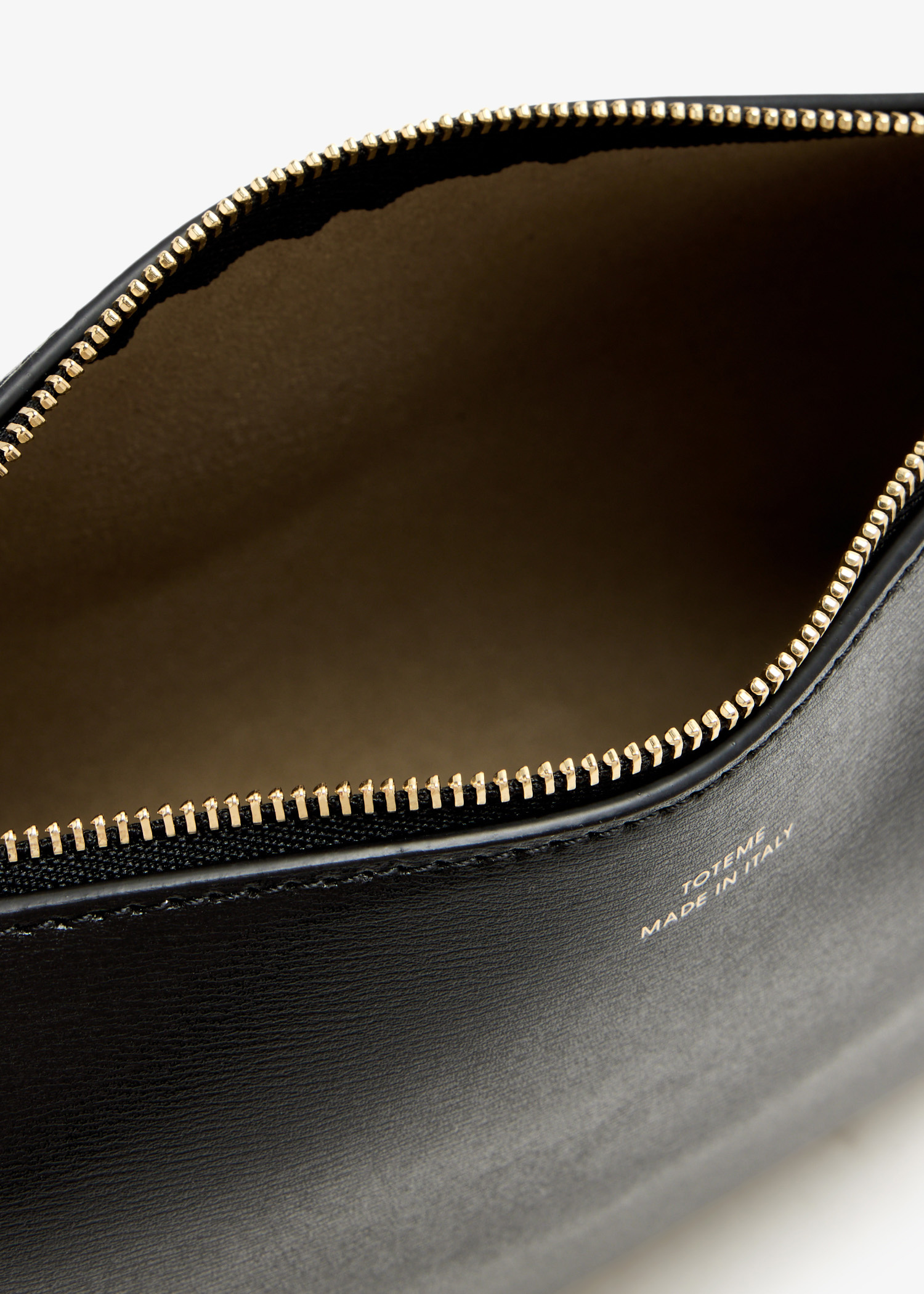 TOTEME Bevel leather wristlet for Women - Black in USA | Level Shoes