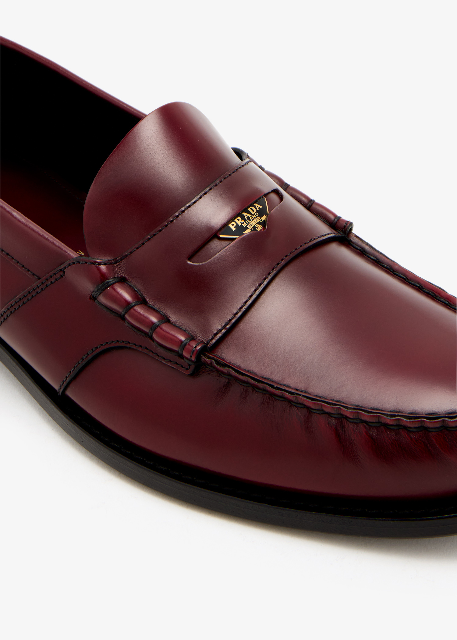 Prada Brushed leather loafers for Men - Burgundy in UAE | Level Shoes