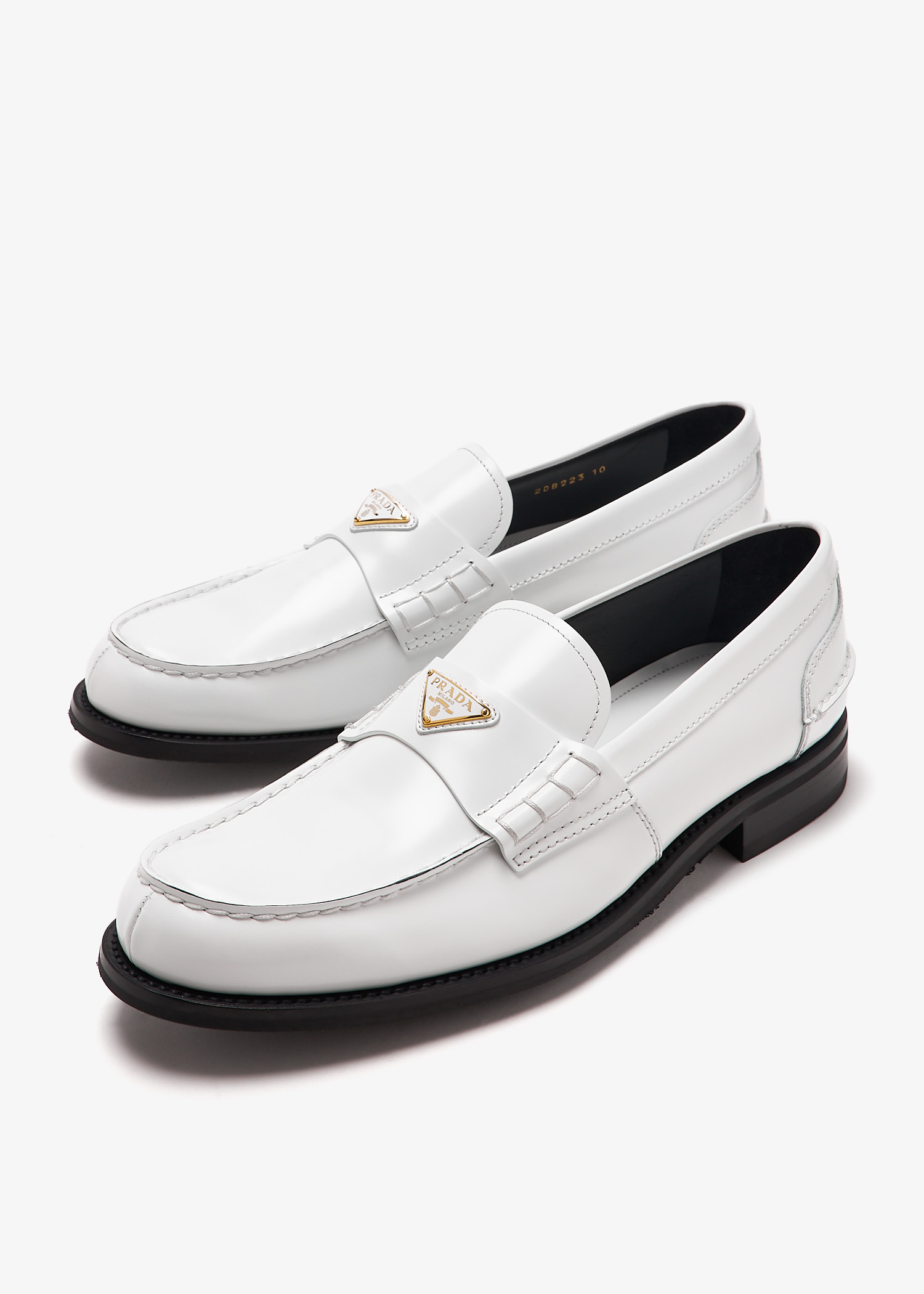 Prada Brushed leather loafers for Men - White in UAE | Level Shoes