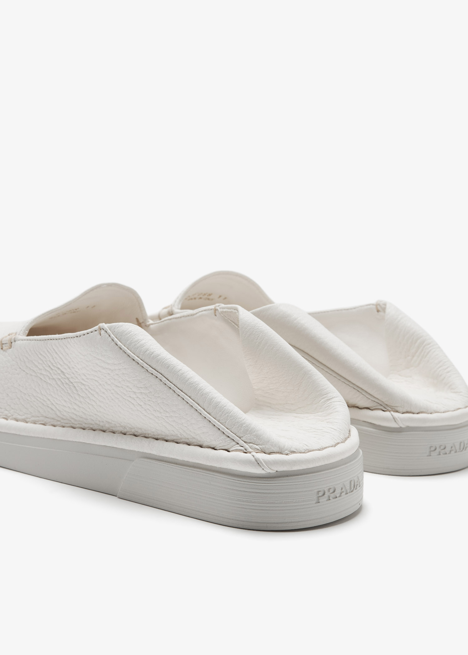 Prada Leather slip-on loafers for Men - Cream in UAE | Level