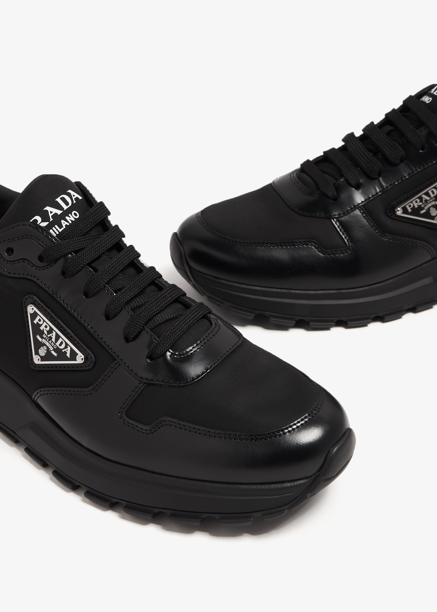 Prada Re-Nylon sneakers for Men - Black in UAE | Level Shoes