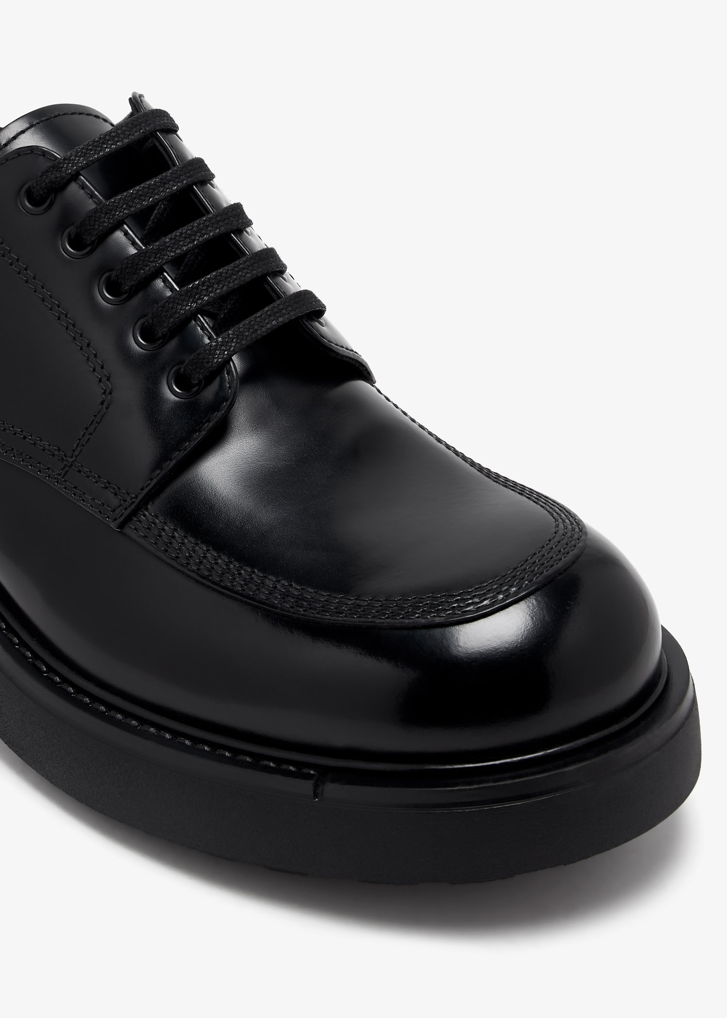 Prada Brushed leather derby shoes for Men - Black in Bahrain