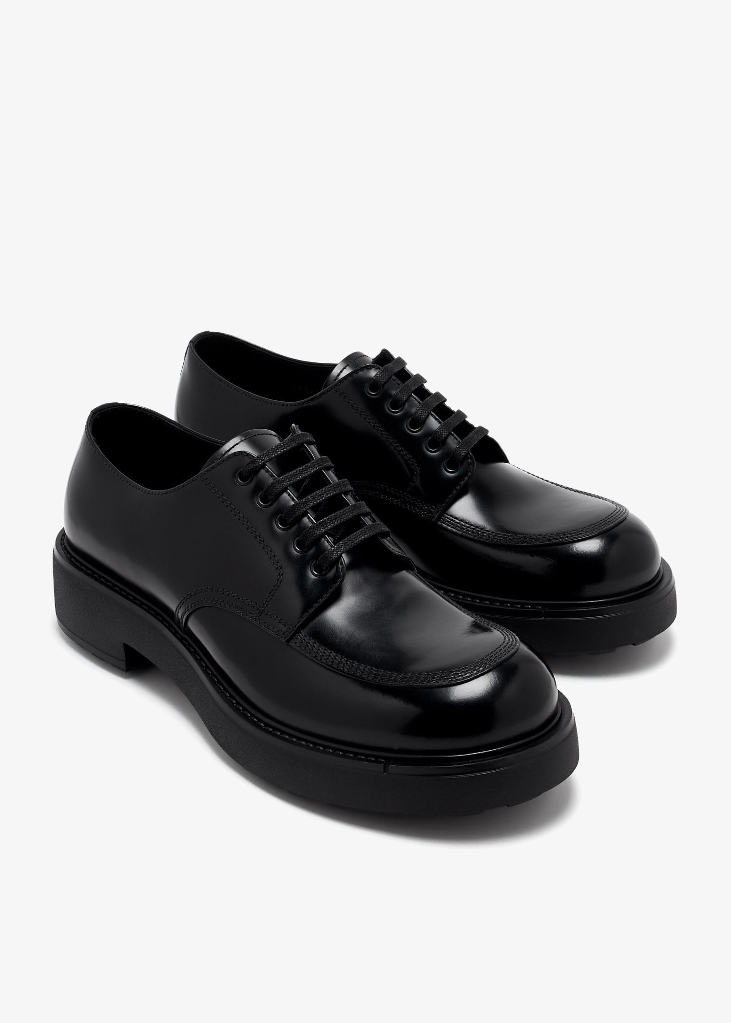 Prada Brushed leather derby shoes for Men - Black in Kuwait