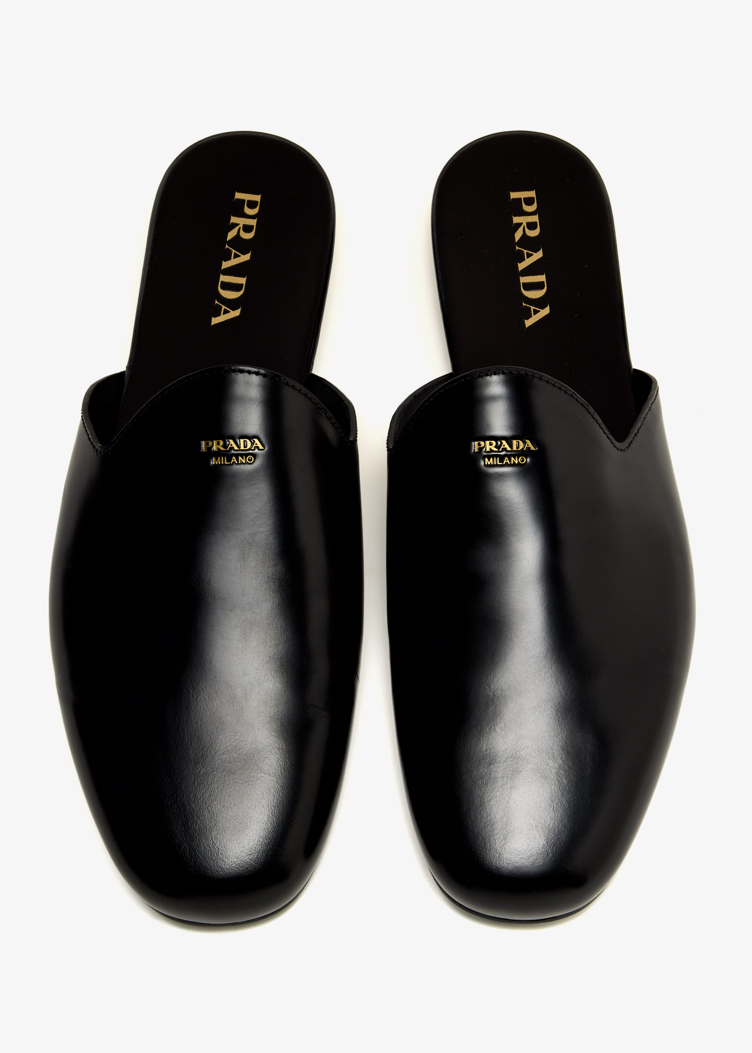 Prada Brushed leather slippers for Men - Black in KSA | Level Shoes