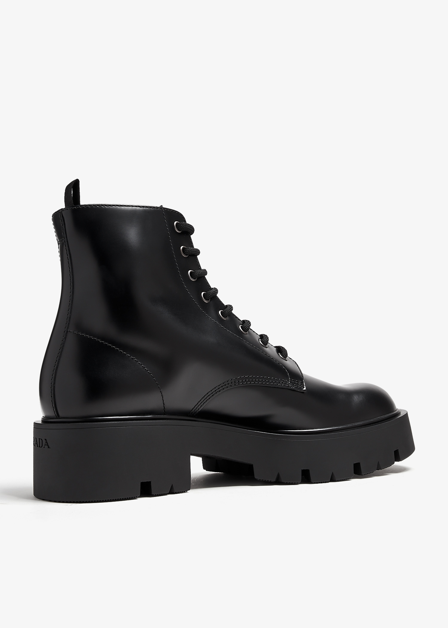 【PRADA】BRUSHED LEATHER COMBAT BOOTS Logo brushed leather combat boots in black - Prada | Mytheresa