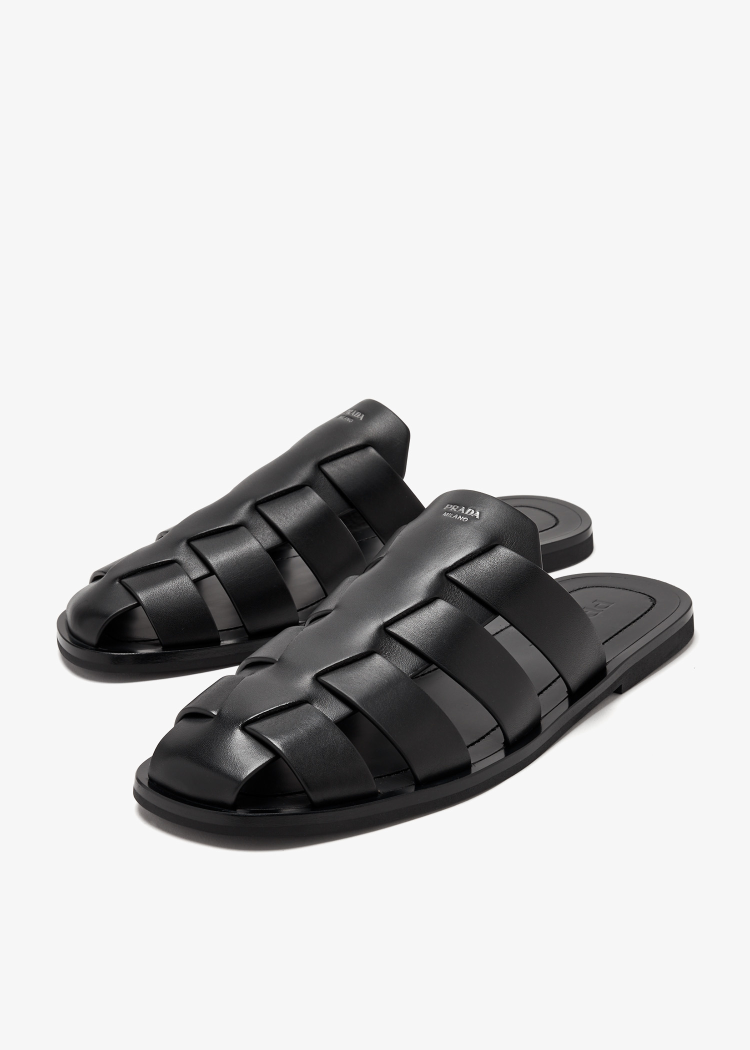 Prada Leather fisherman mules for Men - Black in KSA | Level Shoes