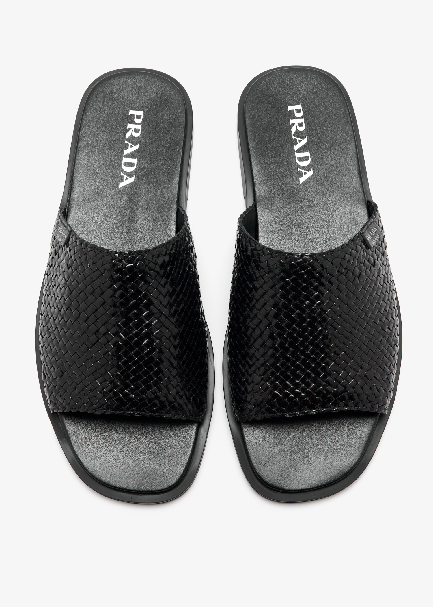 Prada Woven leather slide sandals for Men - Black in UAE | Level Shoes