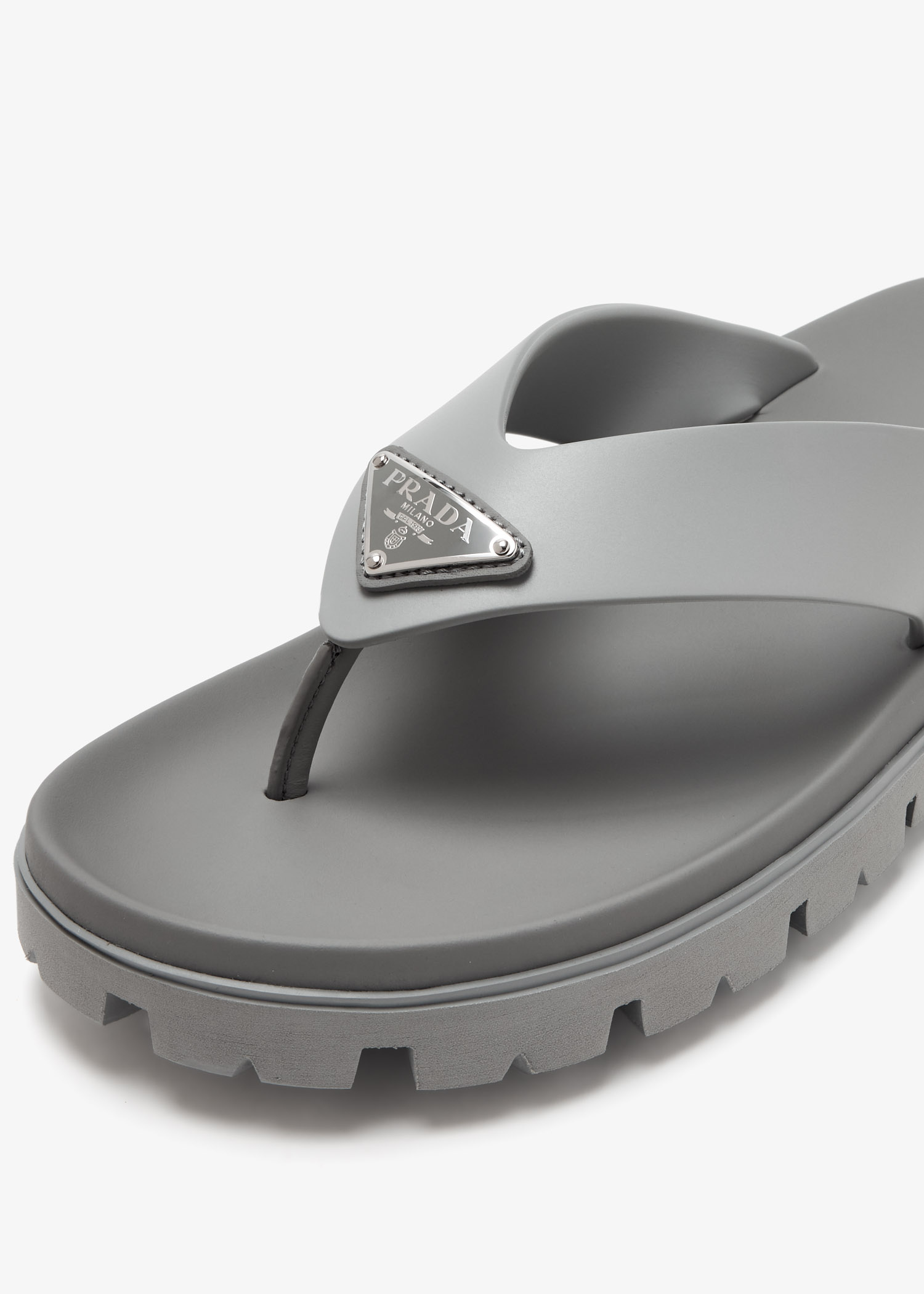 Prada Rubber thong sandals for Men - Grey in UAE | Level Shoes