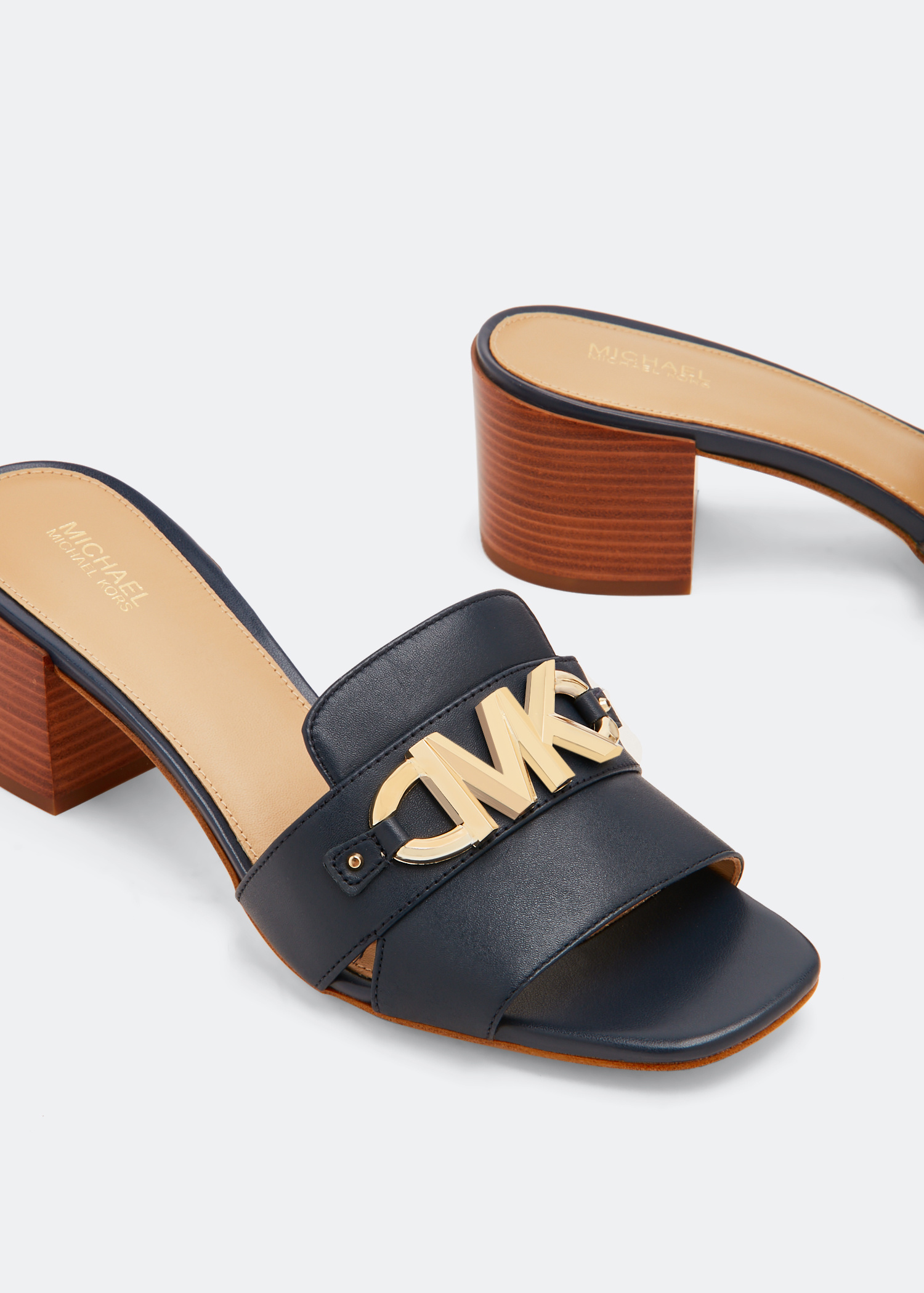 Michael Kors Izzy mules for Women - Blue in USA | Level Shoes
