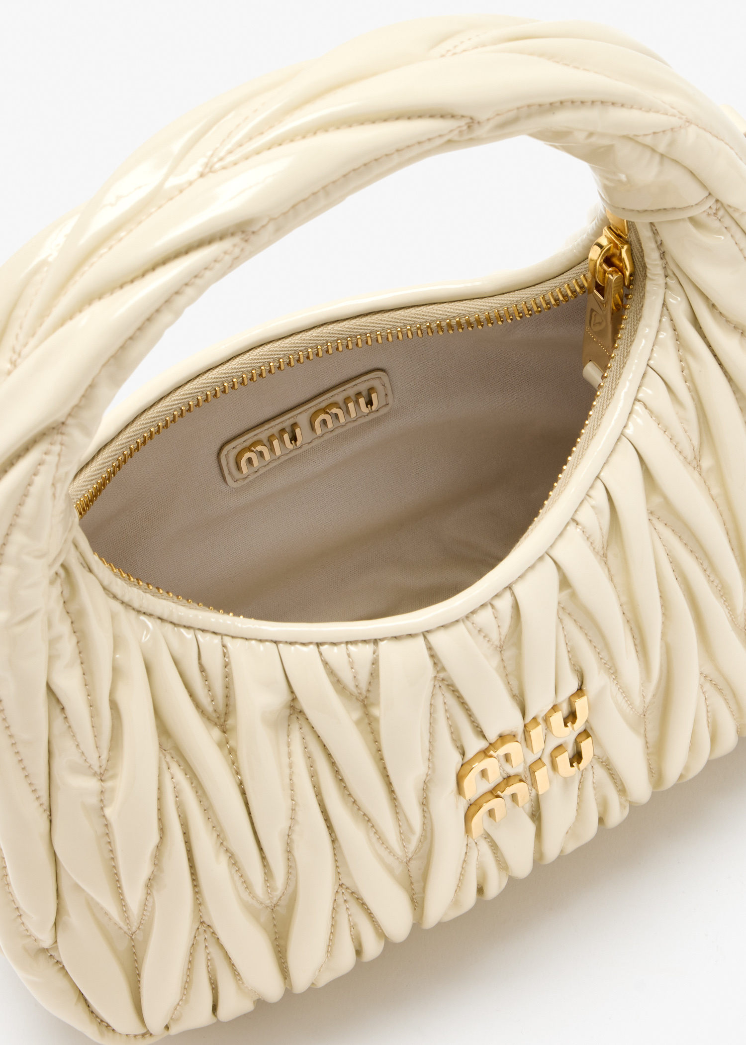Miu Miu Wander matelassé patent leather bag for Women - Cream in