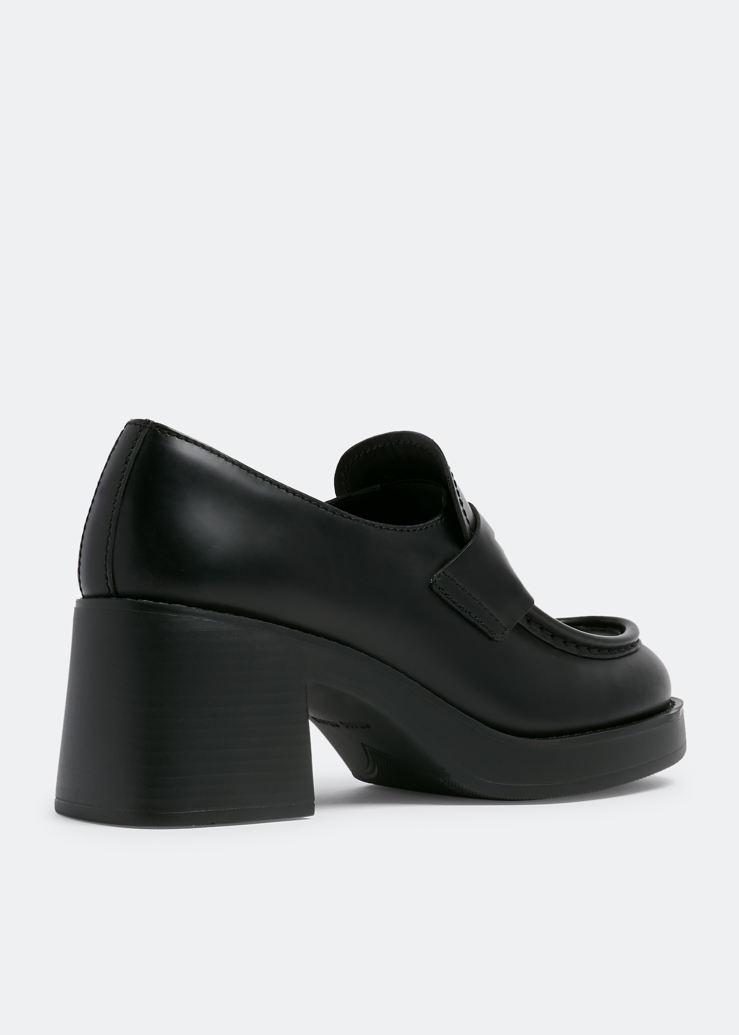 Miu Miu Leather penny loafers for Women - Black in UAE | Level Shoes