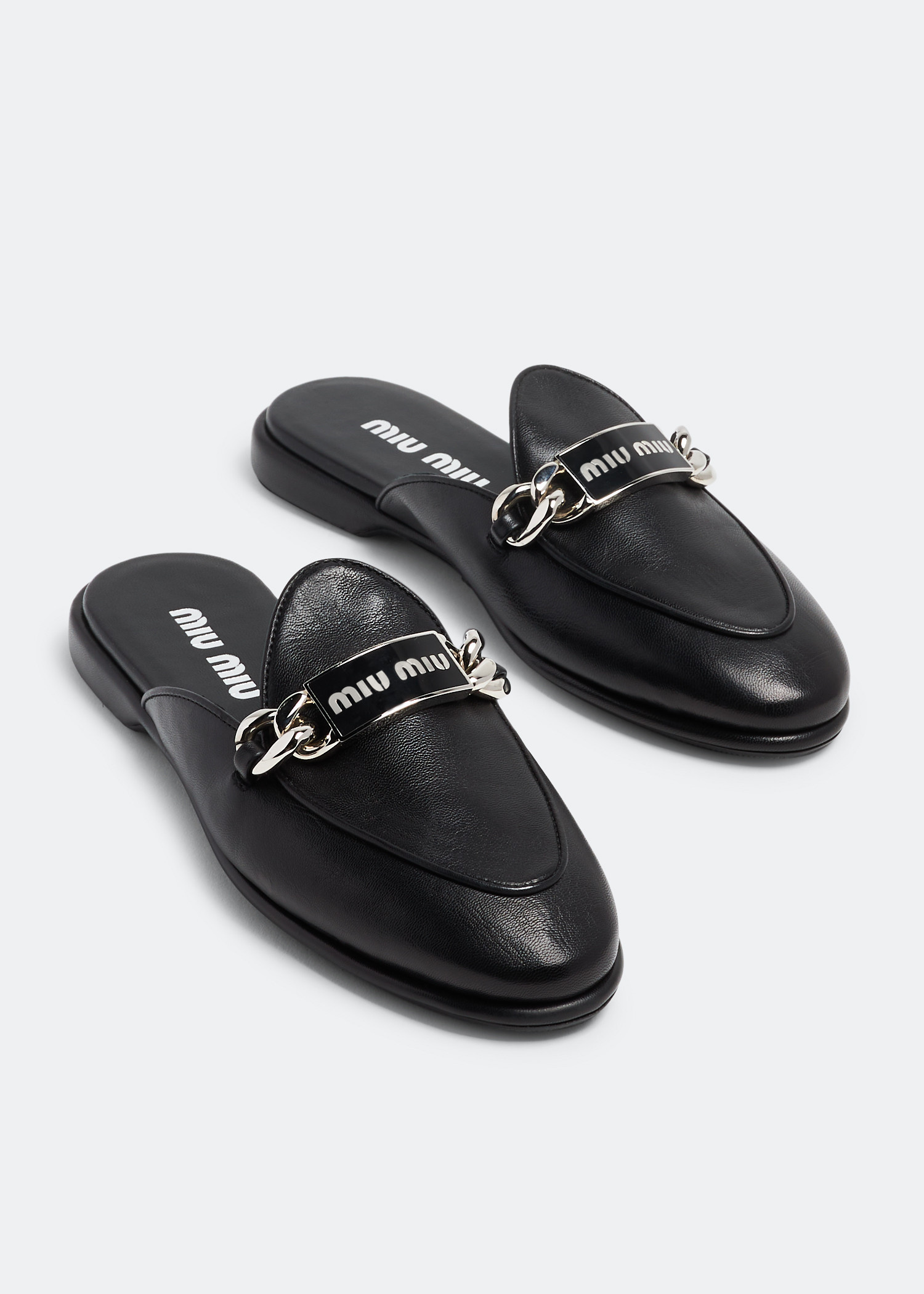 Miu Miu Leather slippers for Women - Black in UAE | Level Shoes