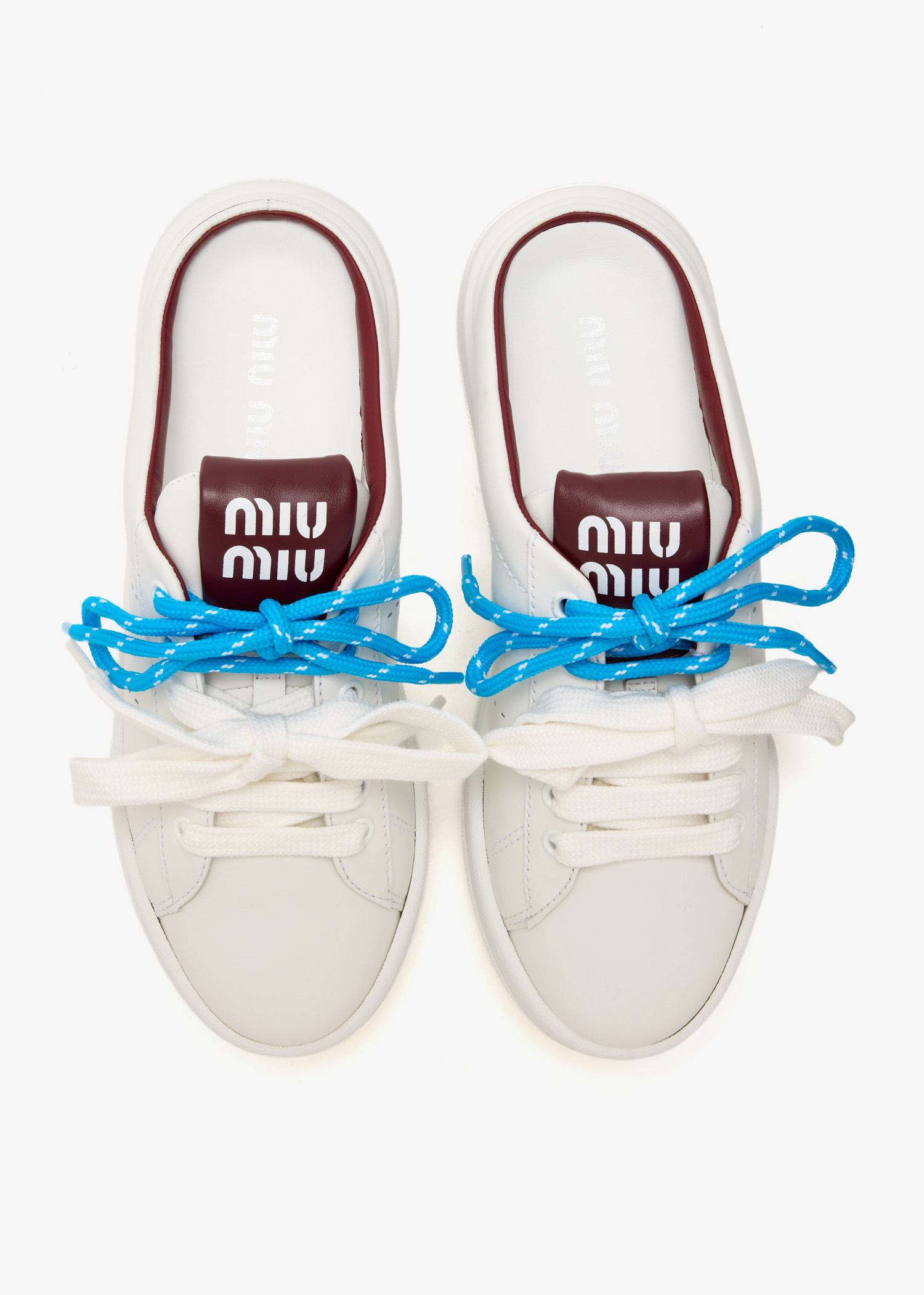 Miu Miu Leather sneaker mules for Women - White in UAE | Level Shoes
