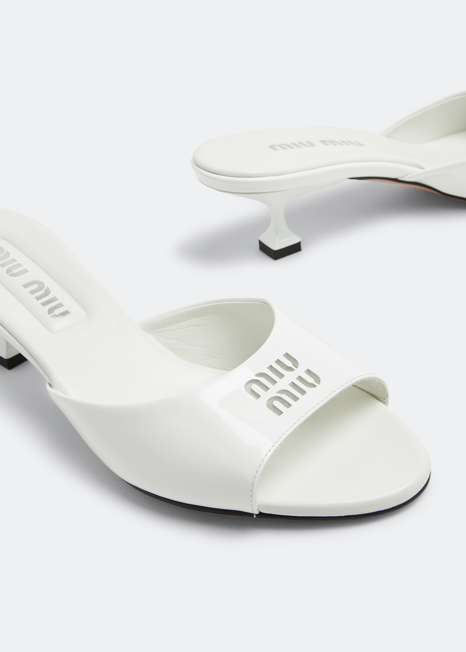 Miu Miu Patent leather sandals for Women - White in UAE | Level Shoes