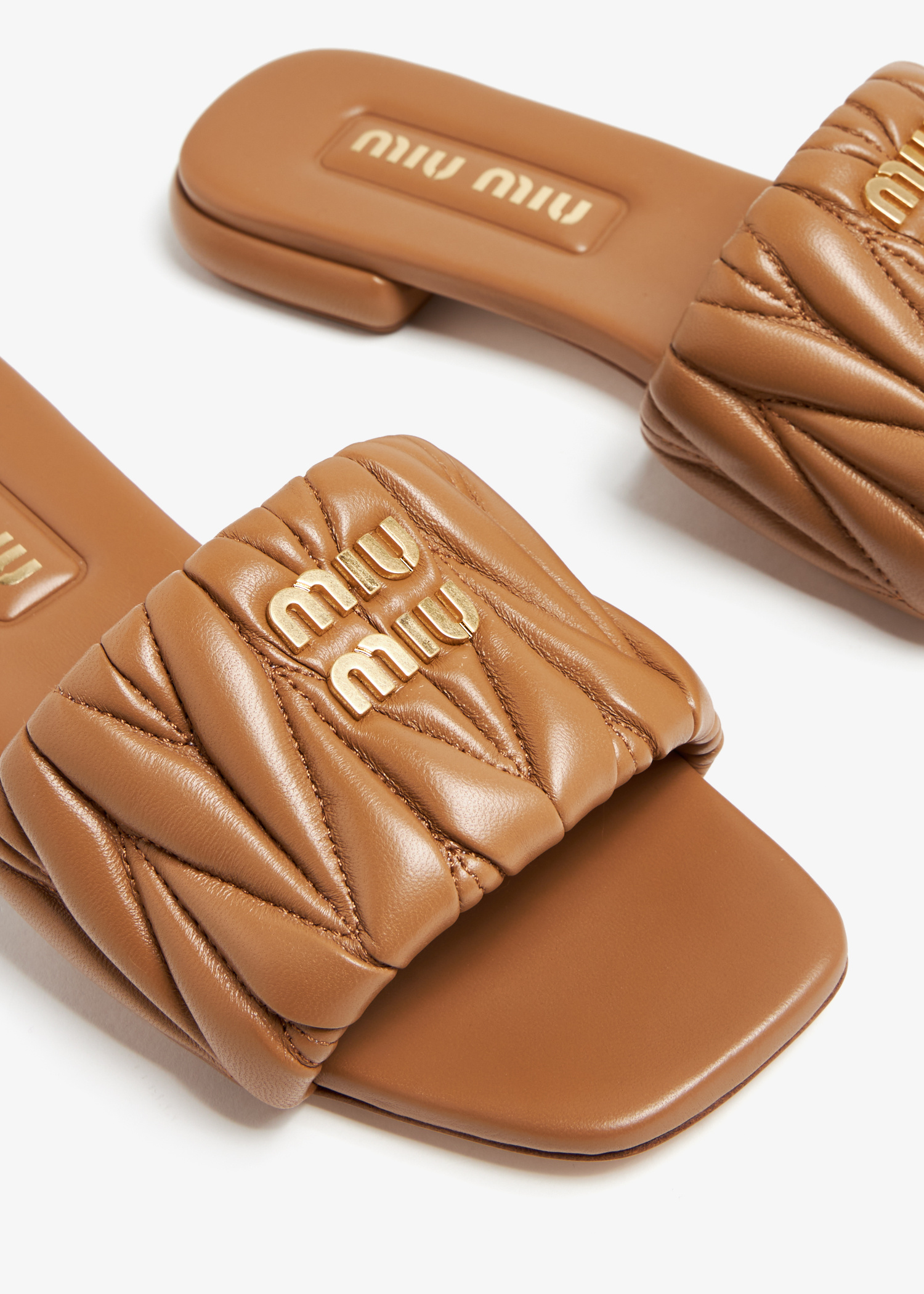 Miu Miu Matelassé leather slide sandals for Women - Brown in UAE