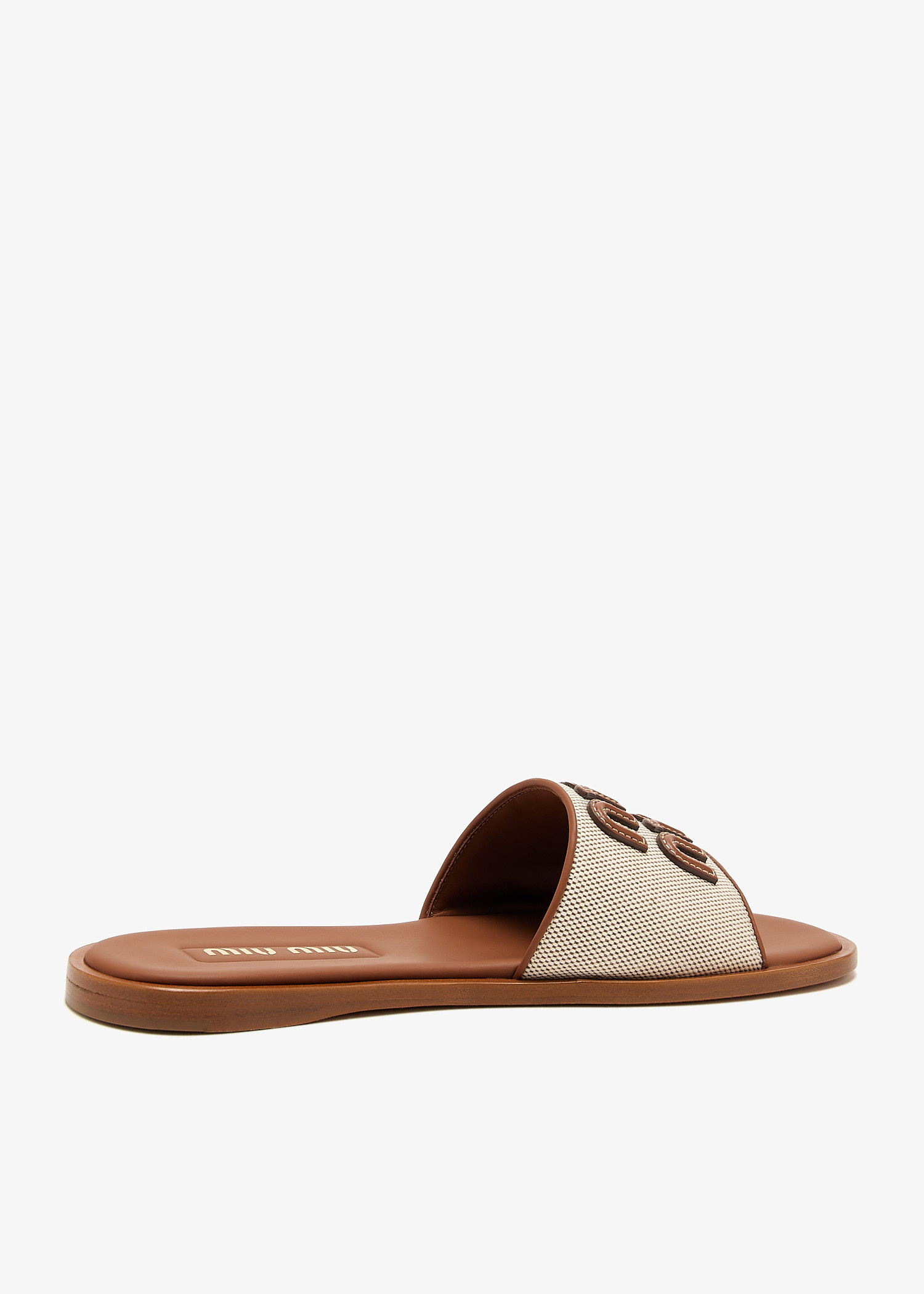 サンダル・ミュール MIU MIIU 5XX644_Q1D_F062F CANVAS AND LEATHER SLIDES Miu Miu Canvas and leather slides - Women | VIETTI Shop