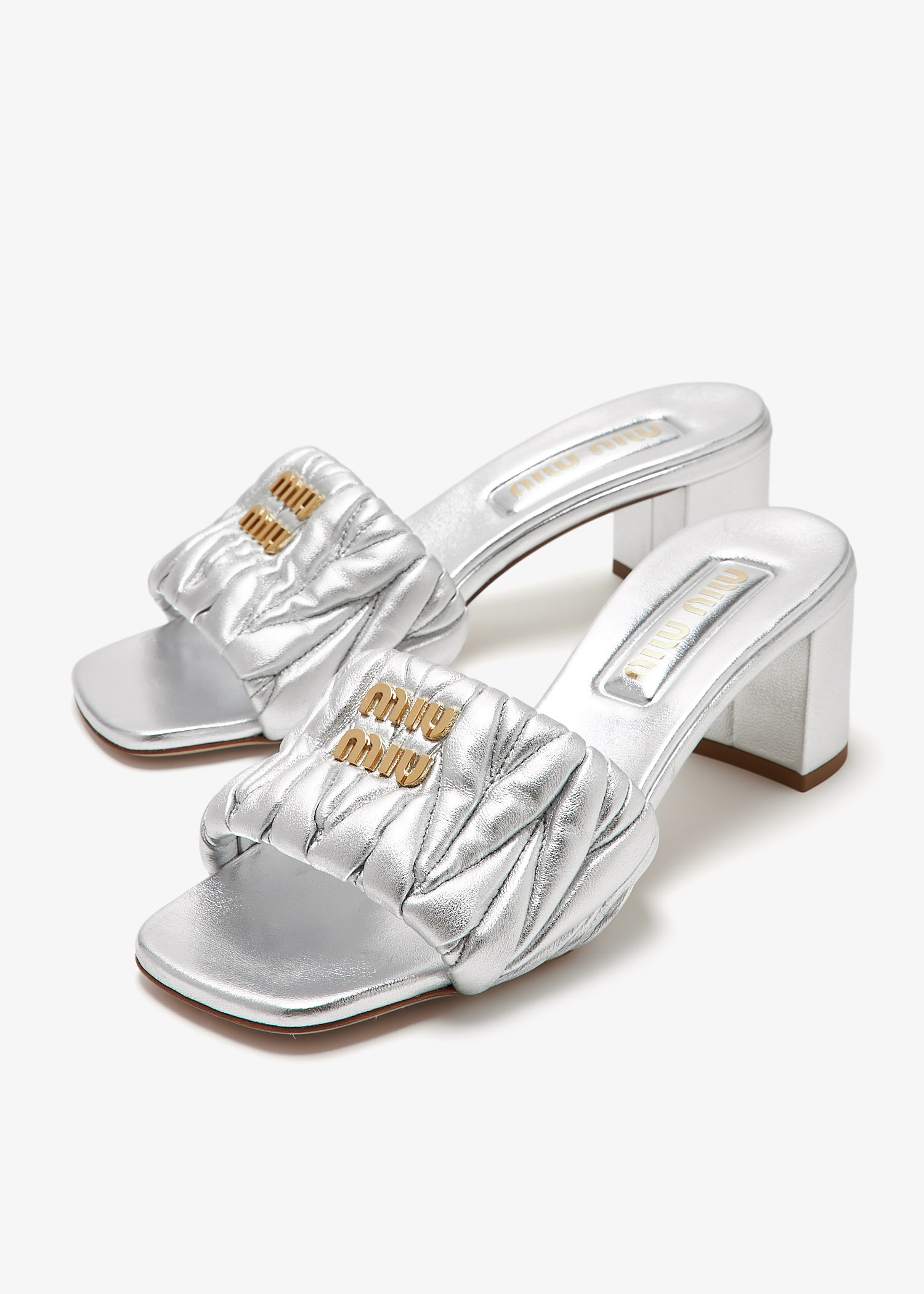 Miu Miu Matelassé leather mule heels for Women - Silver in