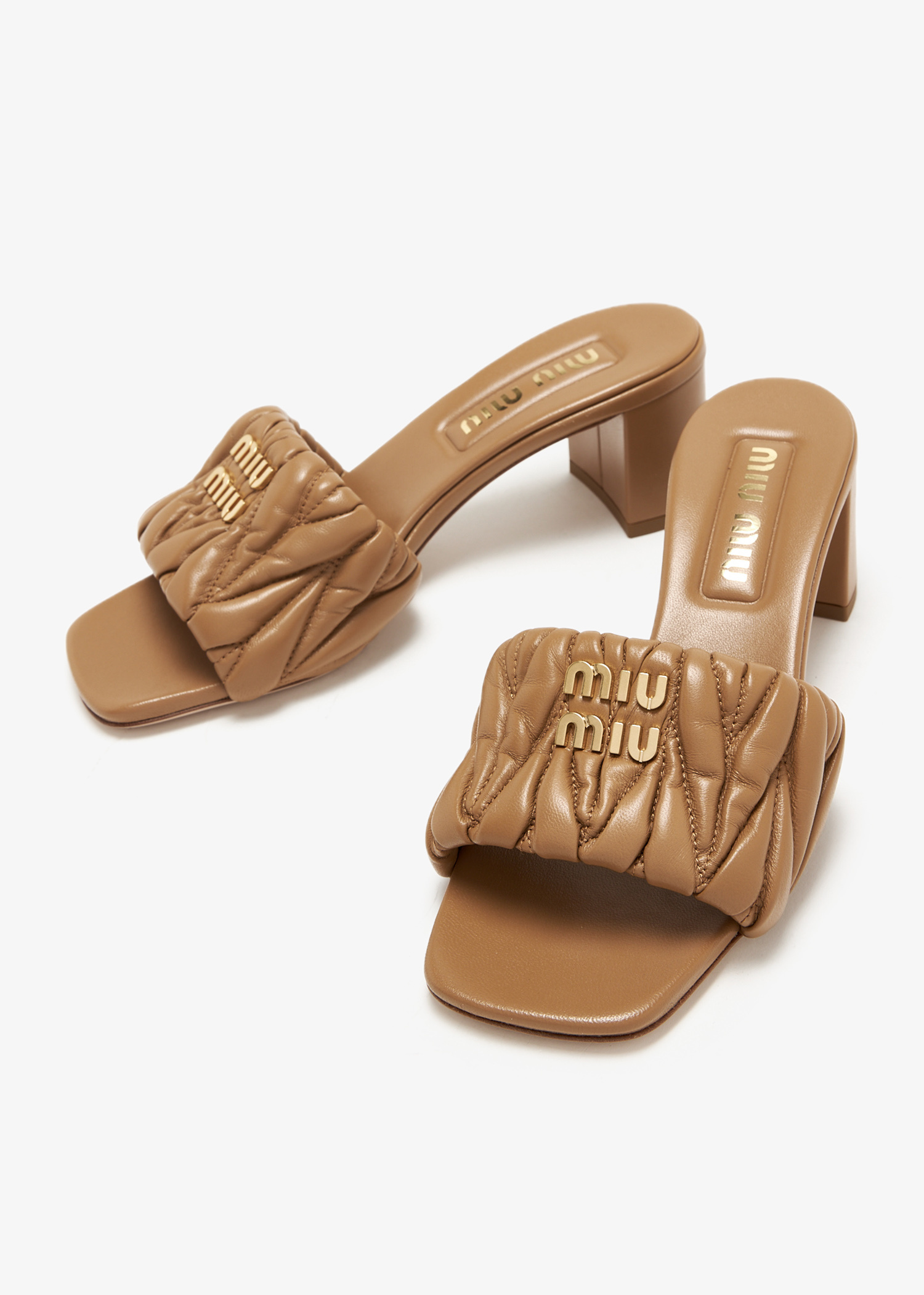 Miu Miu Matelassé nappa leather mule heels for Women - Beige