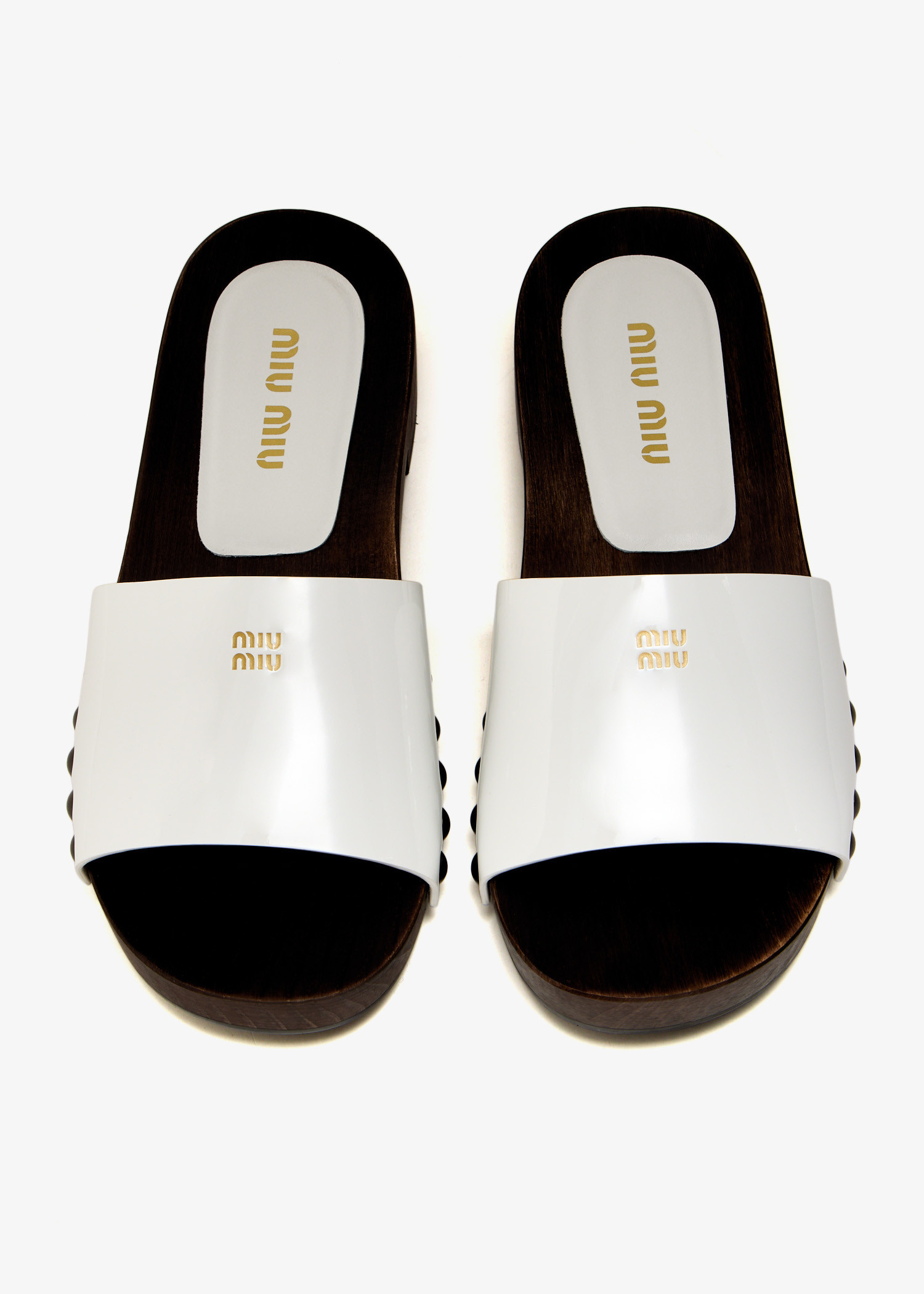 サンダル・ミュール Miu Miu White Leather Clogs Miu Miu Patent leather clogs for Women - White in UAE