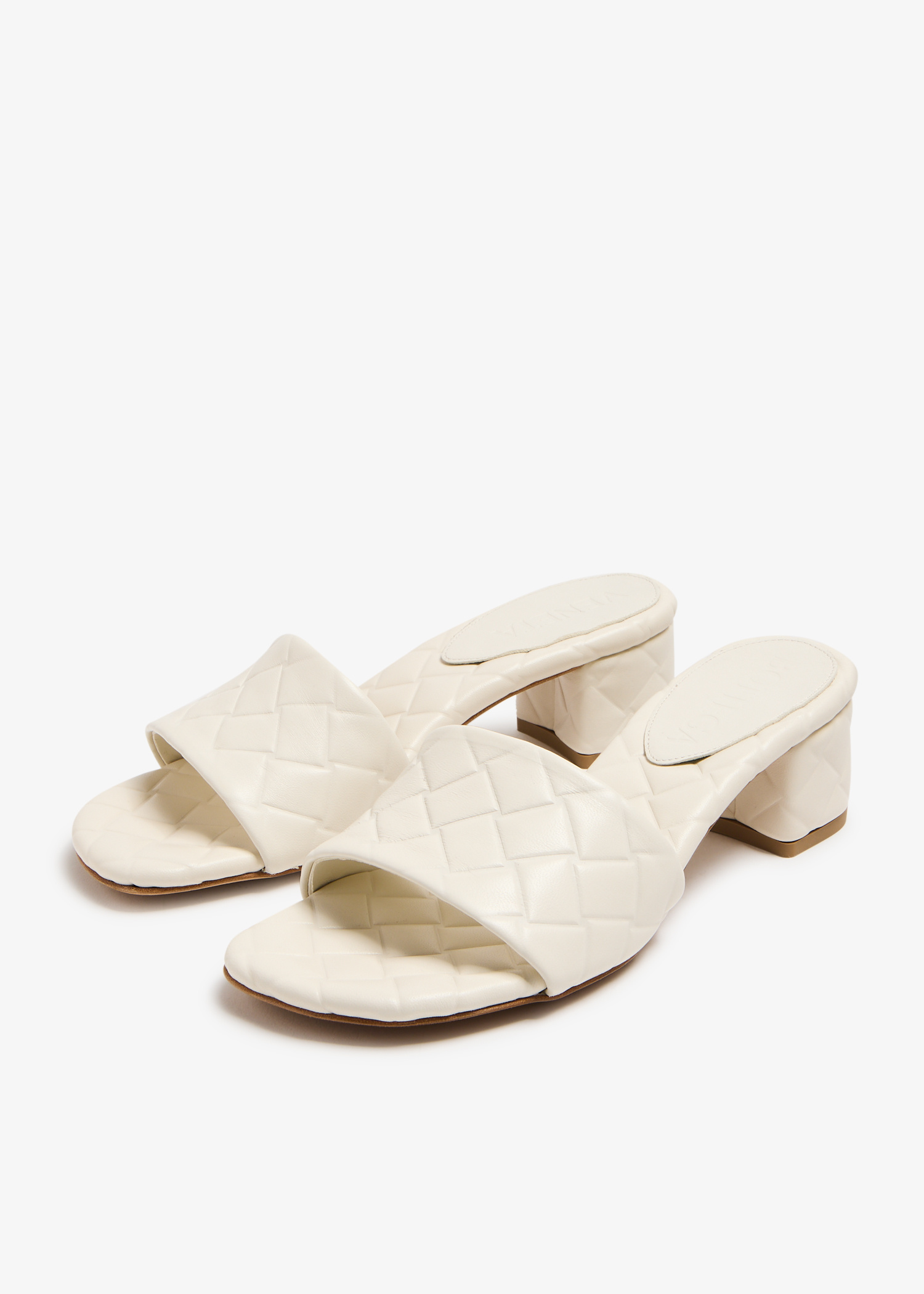 Bottega Veneta Amy mules for Women - White in UAE | Level Shoes