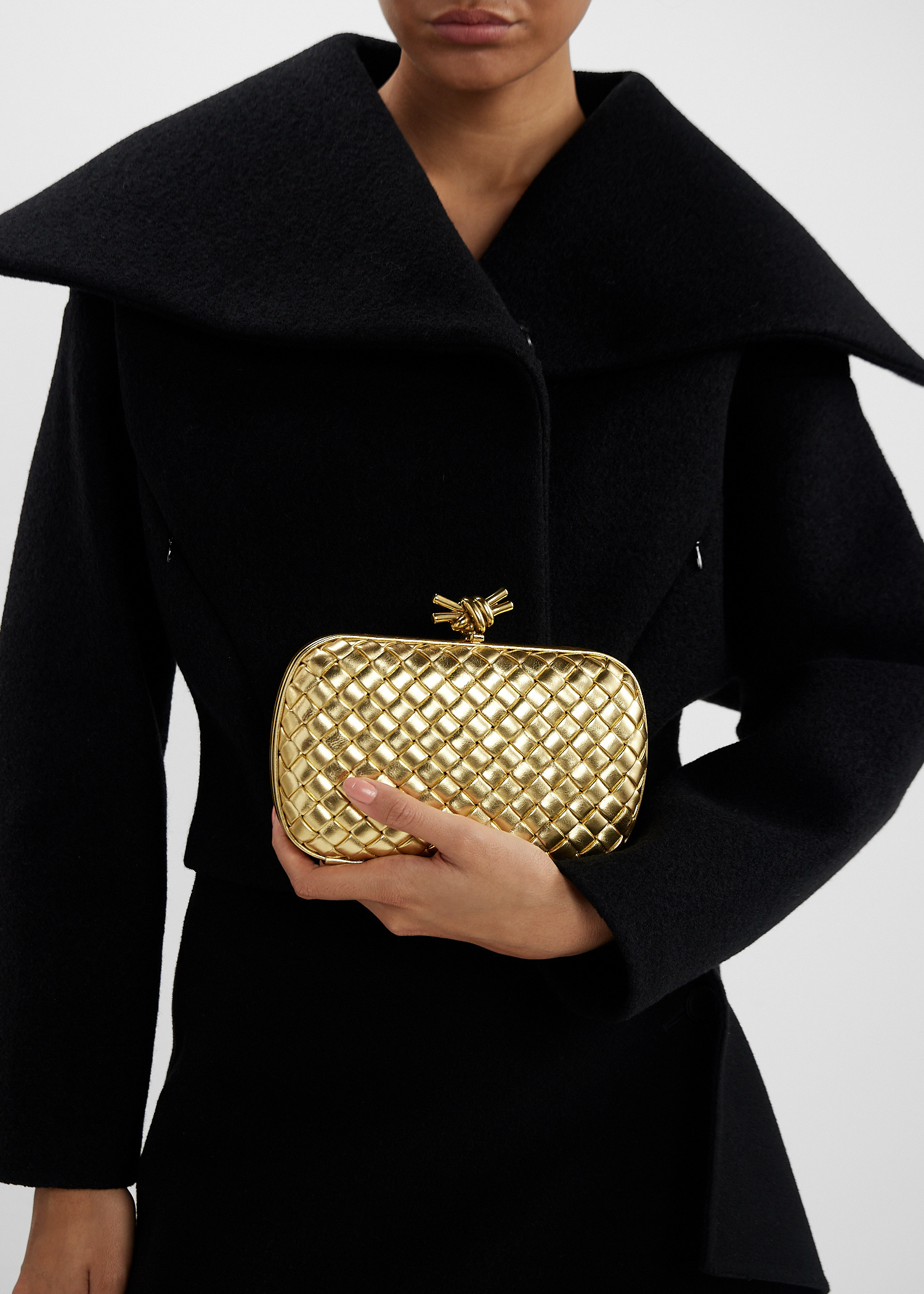 Bottega Veneta Knot clutch for Women - Gold in UAE | Level Shoes