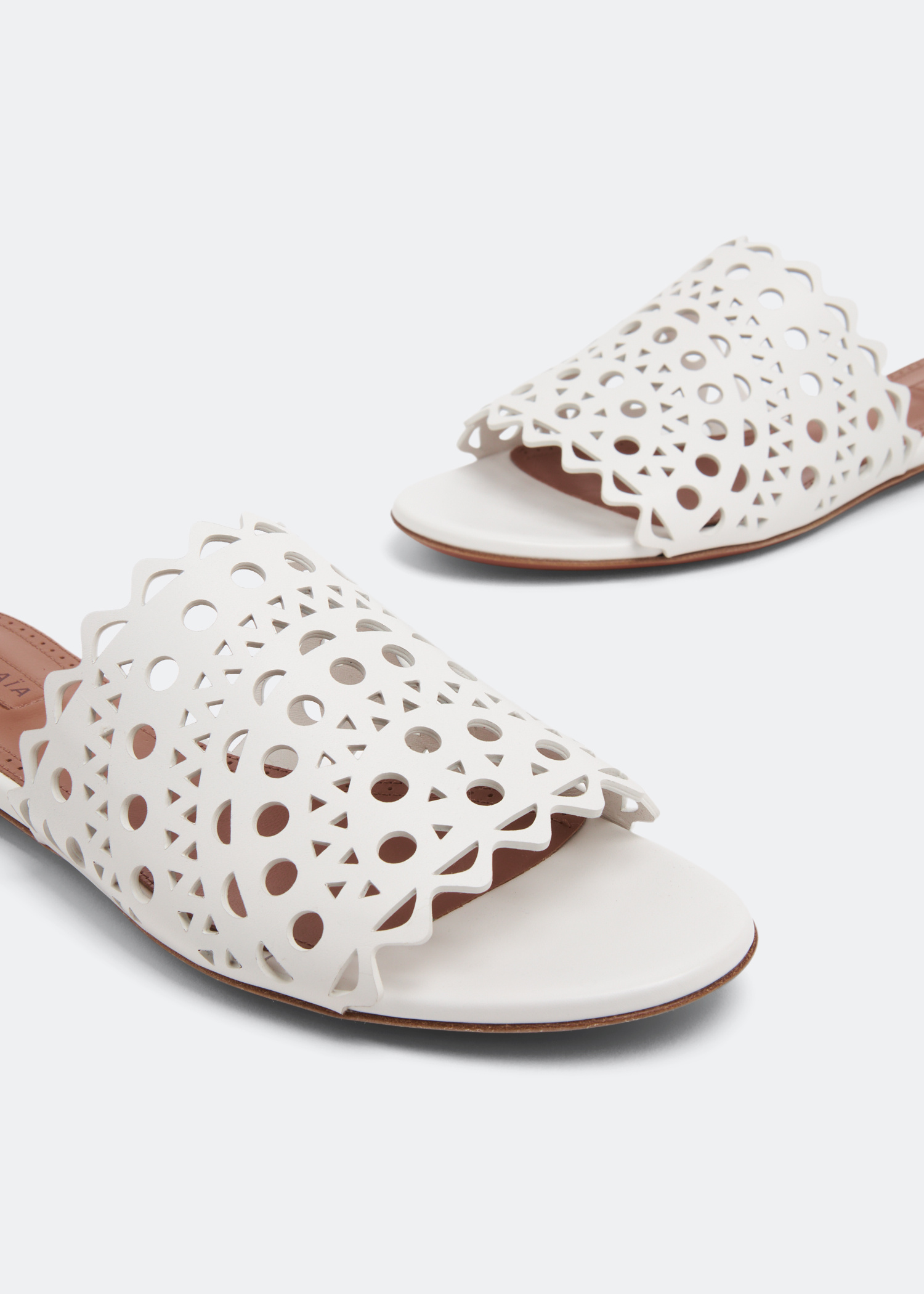 Alaïa Vienne sandals for Women - White in USA | Level Shoes