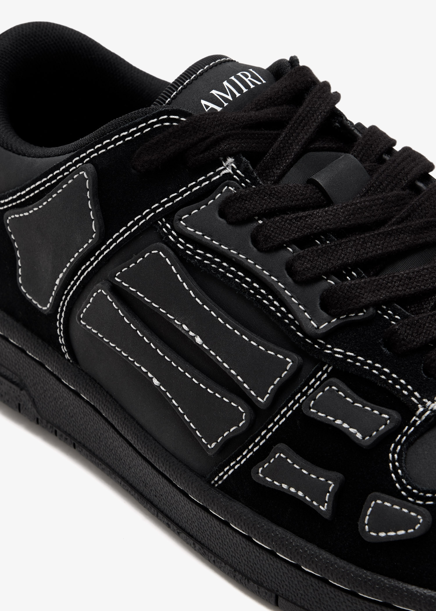 AMIRI Skel low-top sneakers for Men - Black in USA | Level Shoes
