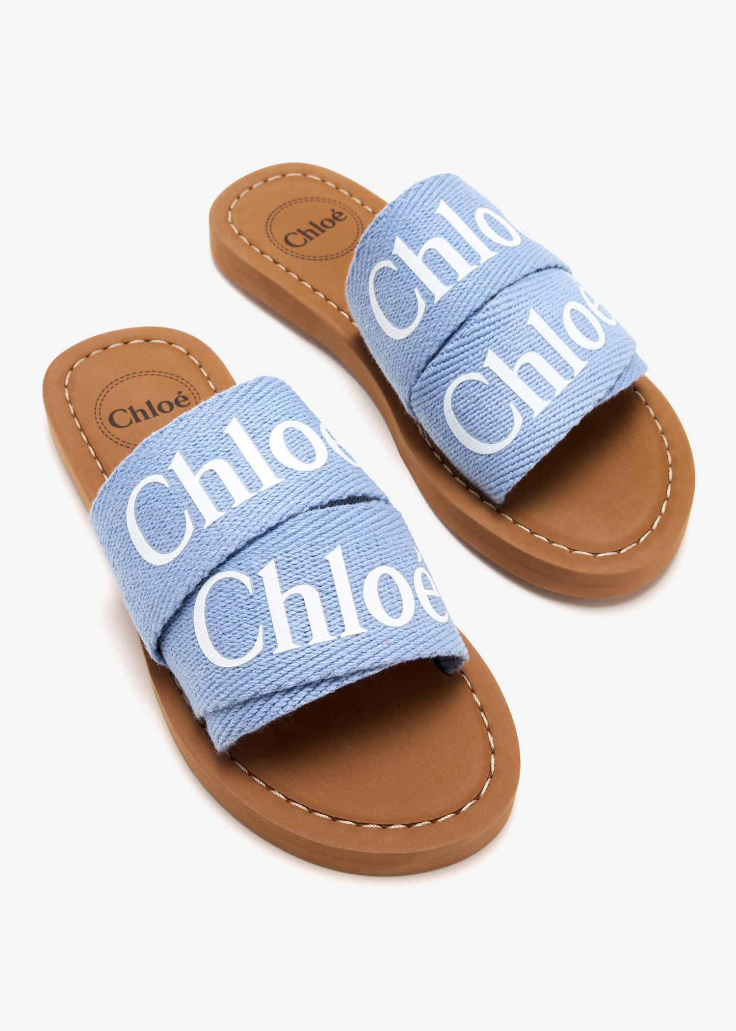 爽やかブルーが足元を彩る ☆ CHLOE Woody light blue slides Chloé | Woody light blue slides | Savannahs