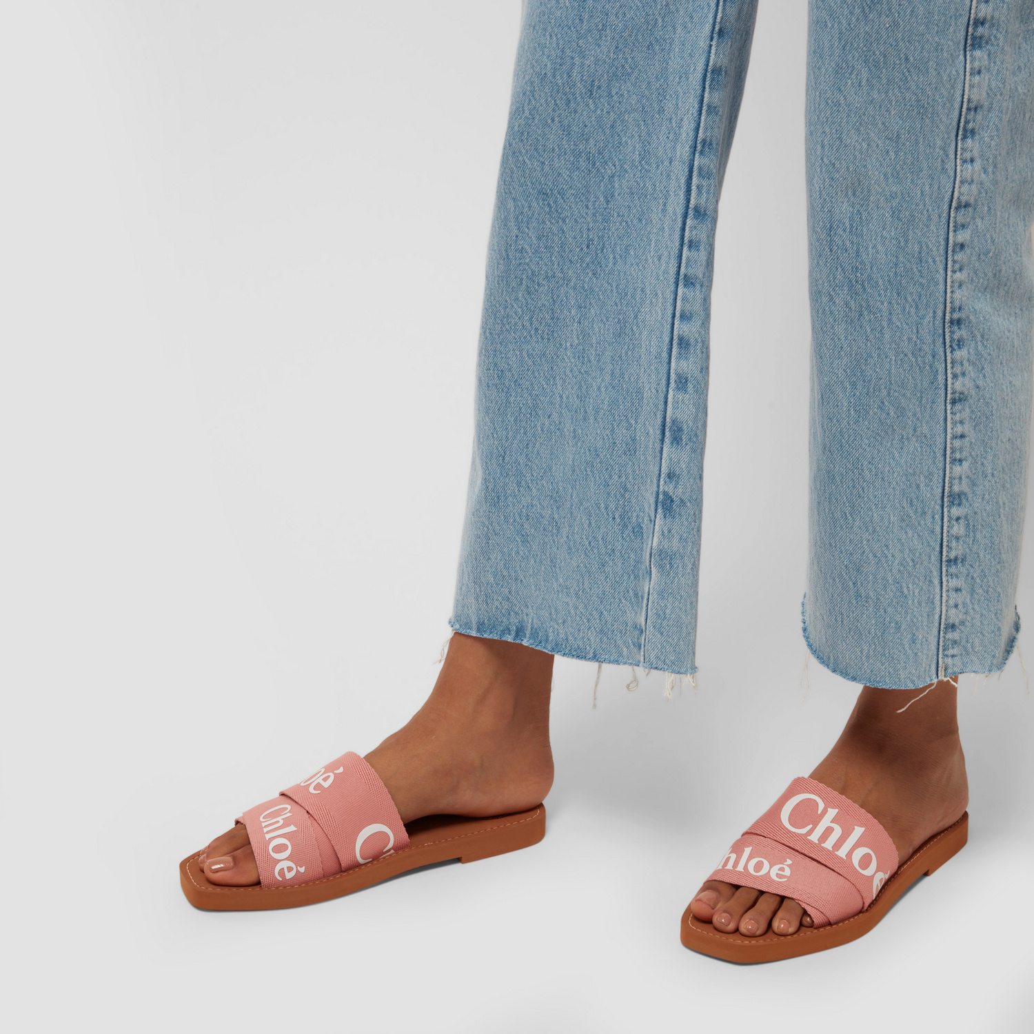 Chloé Woody flat sandals for Women - Pink in USA | Level Shoes