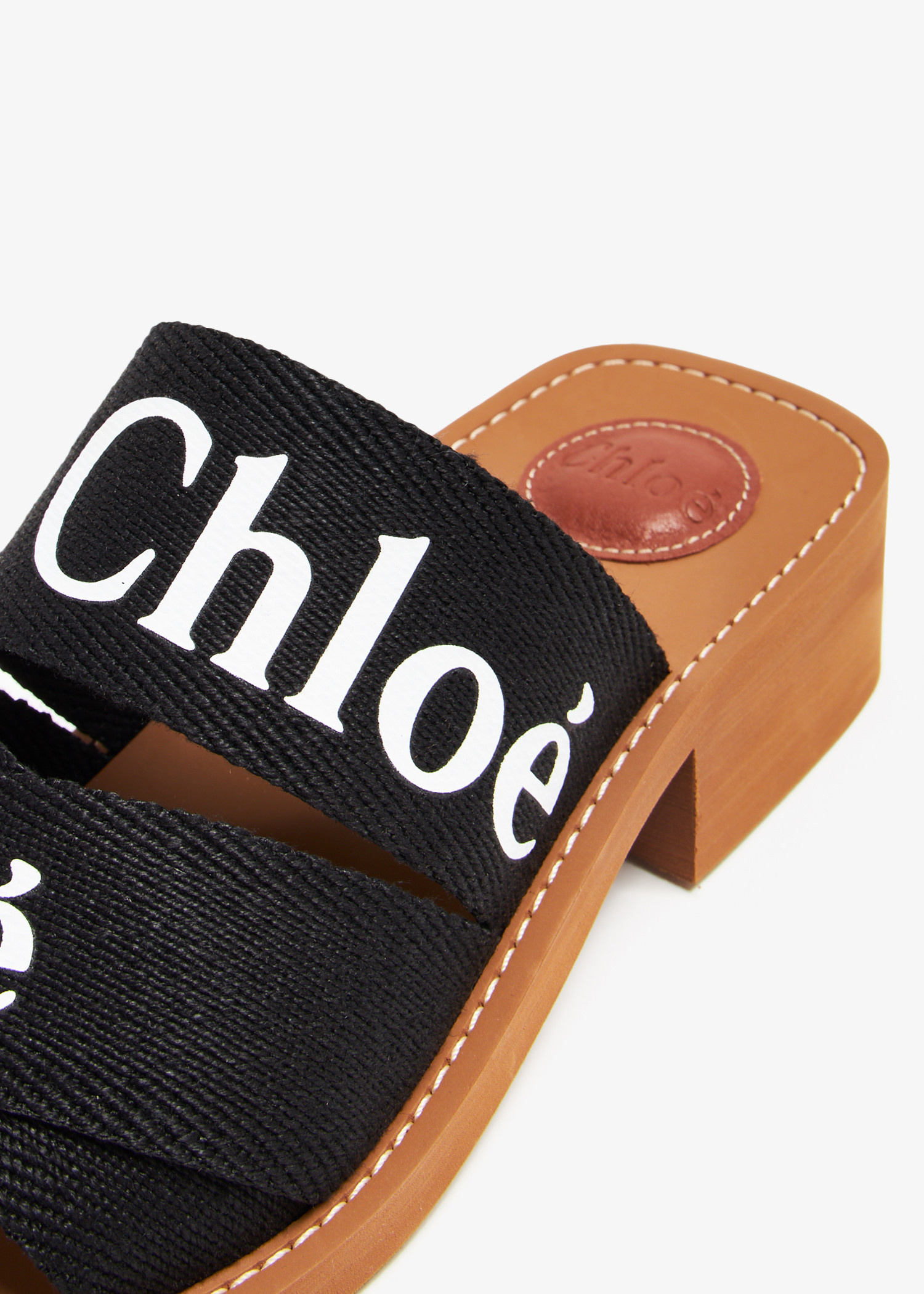 Chloé Woody heeled mules for Women - Black in UAE | Level Shoes