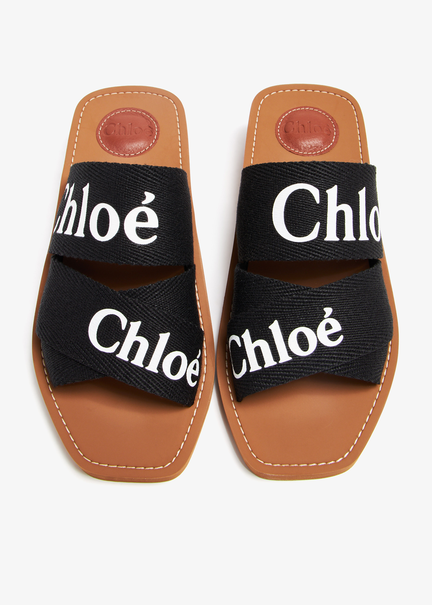 Chloé Woody heeled mules for Women - Black in UAE | Level Shoes