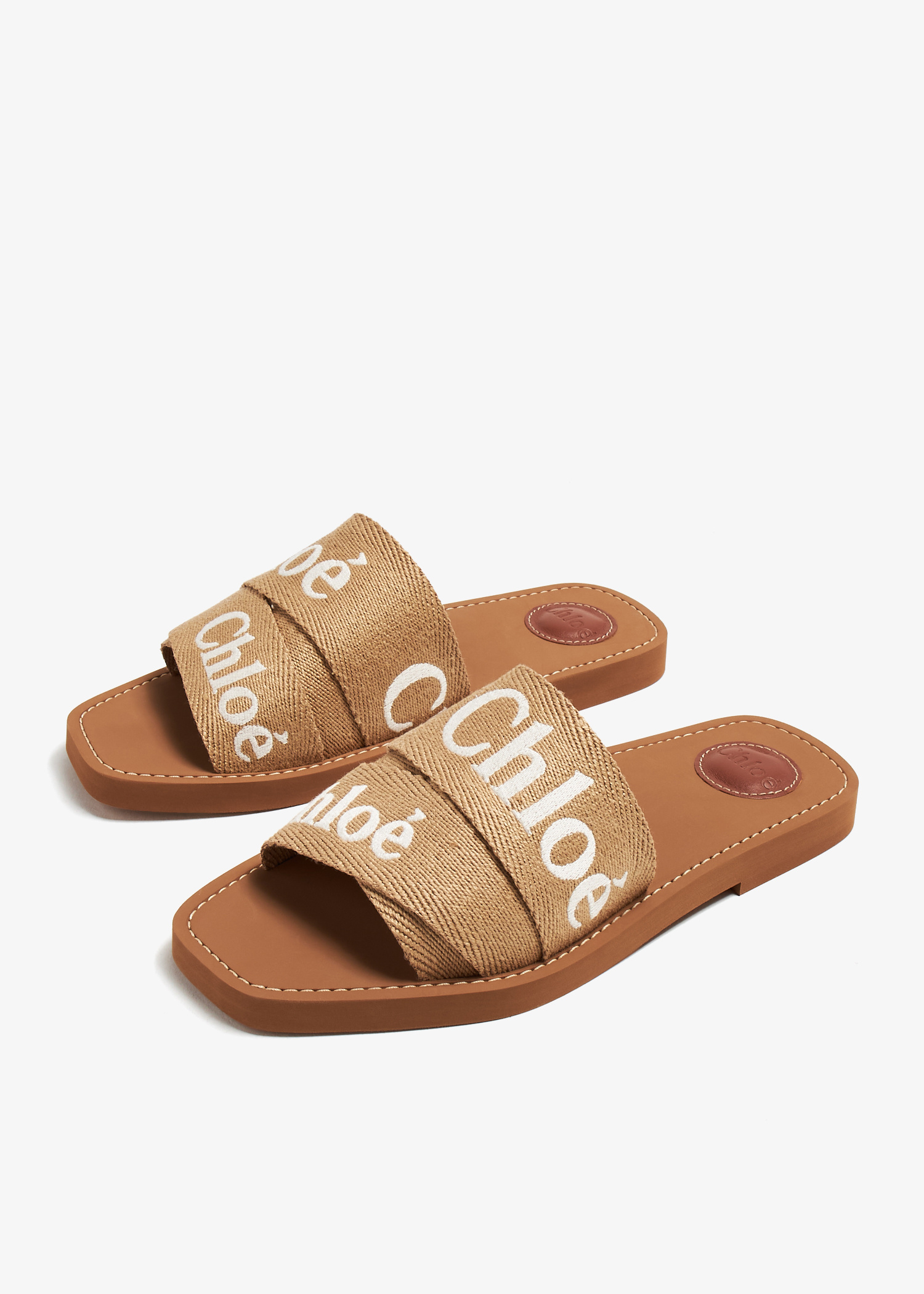 Chloé Woody flat sandals for Women - Beige in UAE | Level Shoes