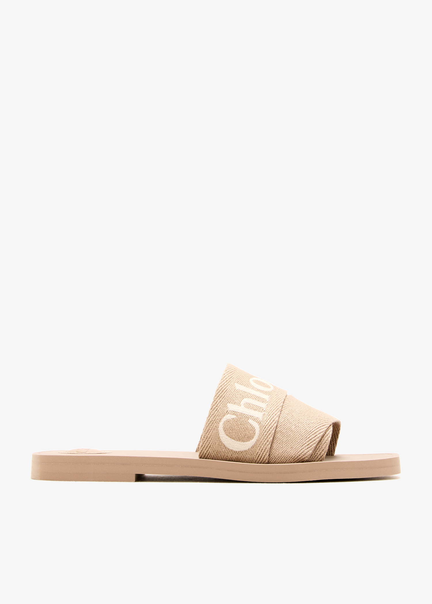 Chloé Woody flat sandals for Women - Beige in UAE | Level Shoes