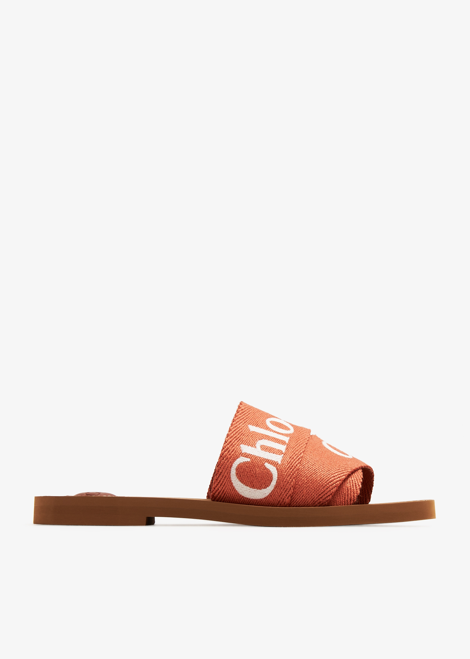 Chloé Woody flat sandals for Women - Orange in UAE | Level Shoes
