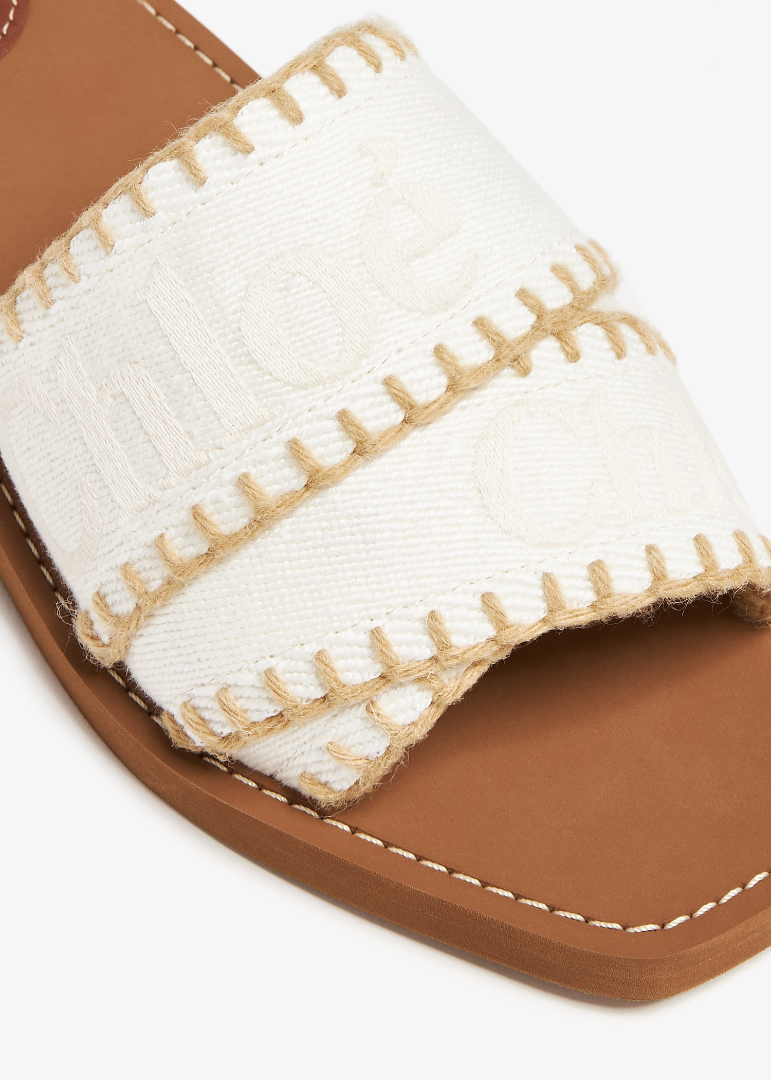 Chloé Woody flat sandals for Women - White in USA | Level Shoes